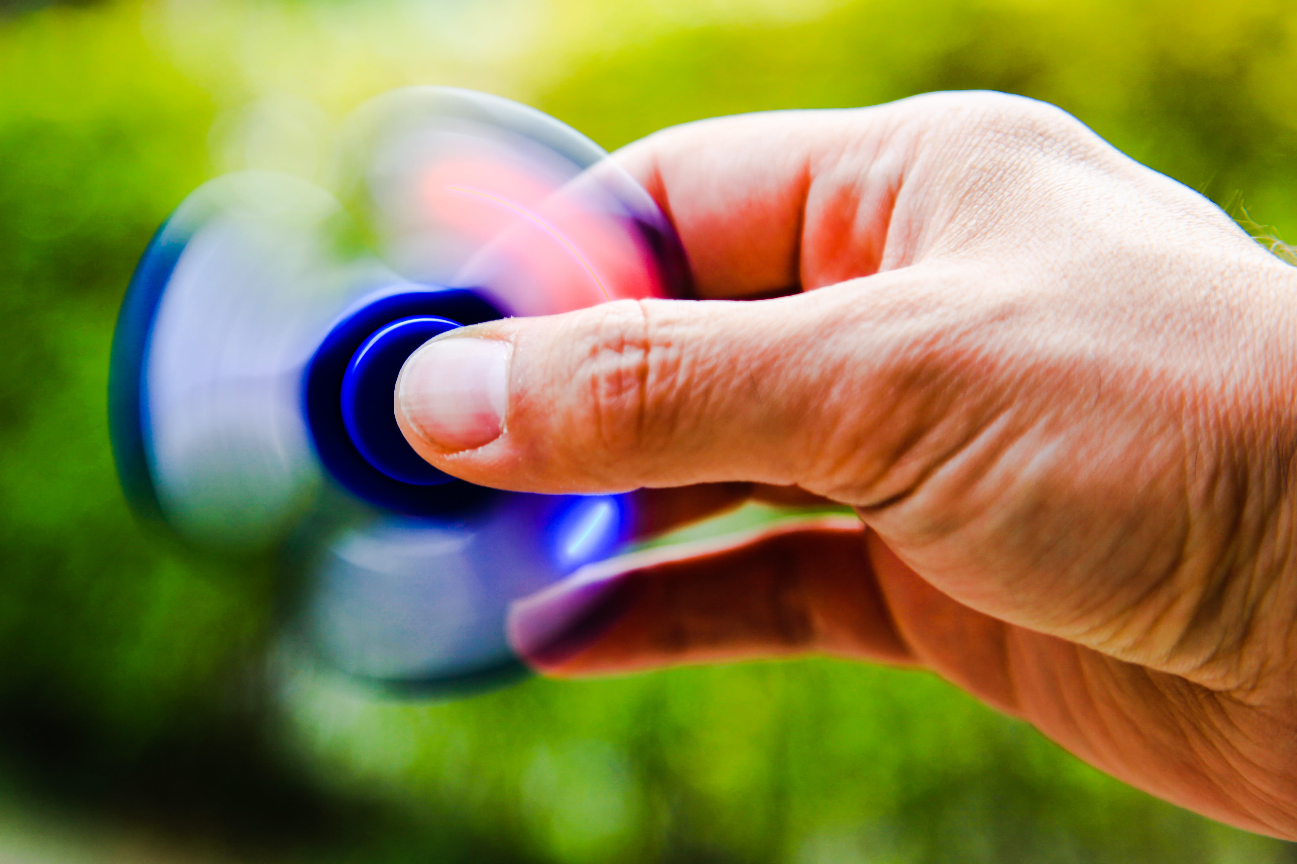 spin, technology, focus on foreground, finger, fidget spinner, recreation, body part, outdoors, human finger, toy, summer, human hand, lifestyles, nail, HD Wallpaper