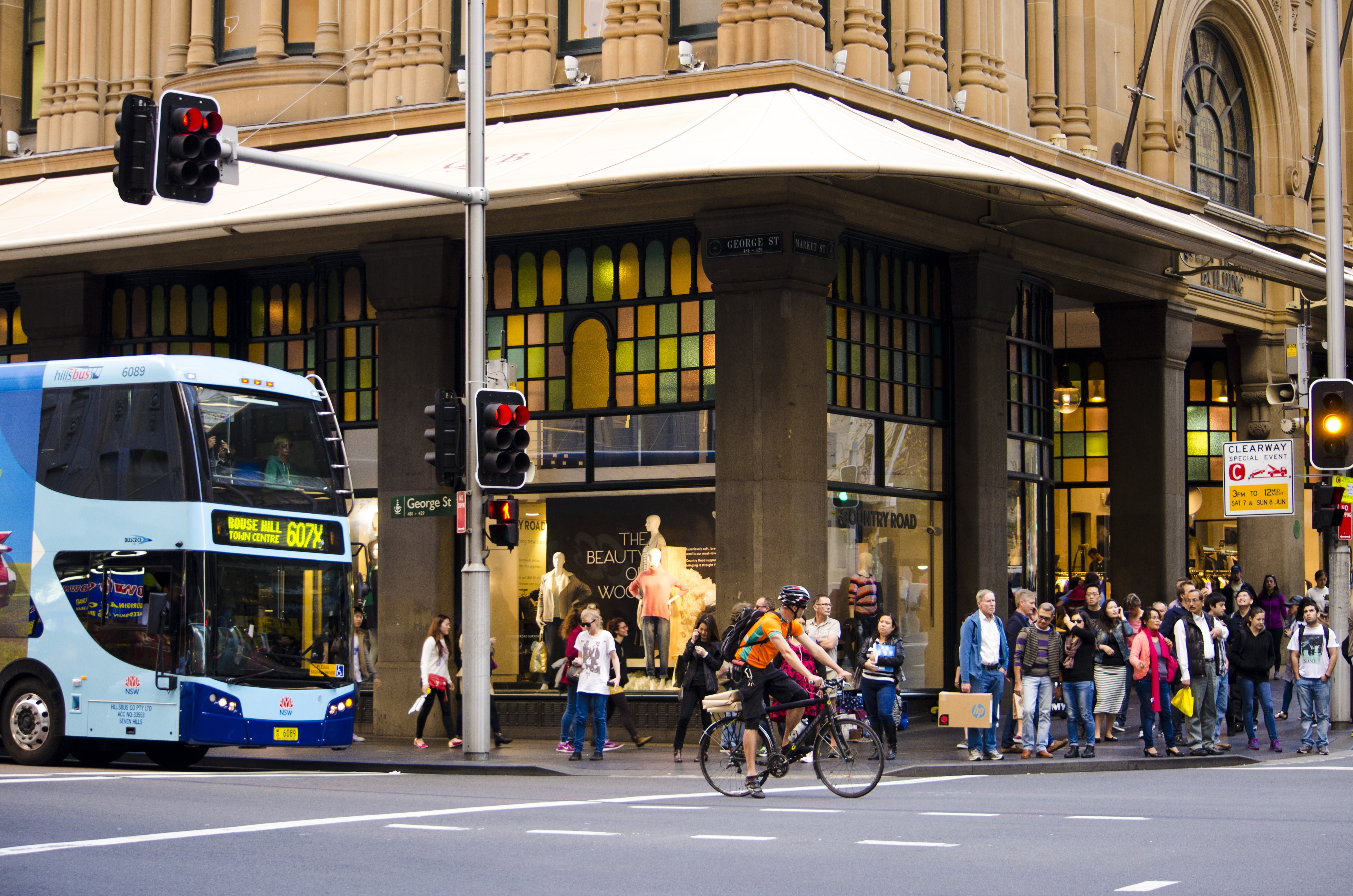 biking, cyclist, land vehicle, bikes, traffic road, sign, shop front, built structure, city life, architecture, men, pedestrian, transportation, traffic light, HD Wallpaper