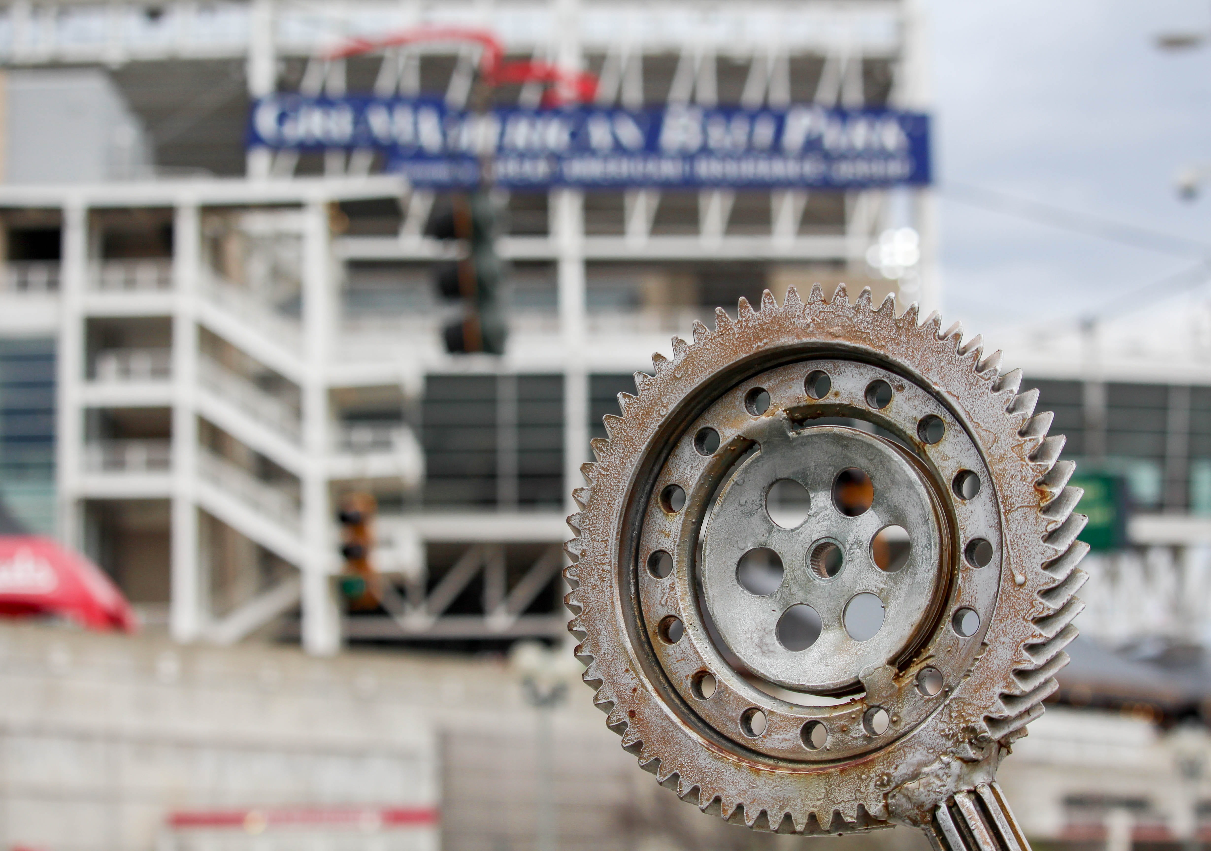 no people, building exterior, focus on foreground, cog, car, land vehicle, metal, street, steel, city, day, 4K, travel, transportation, machinery, tire, HD Wallpaper