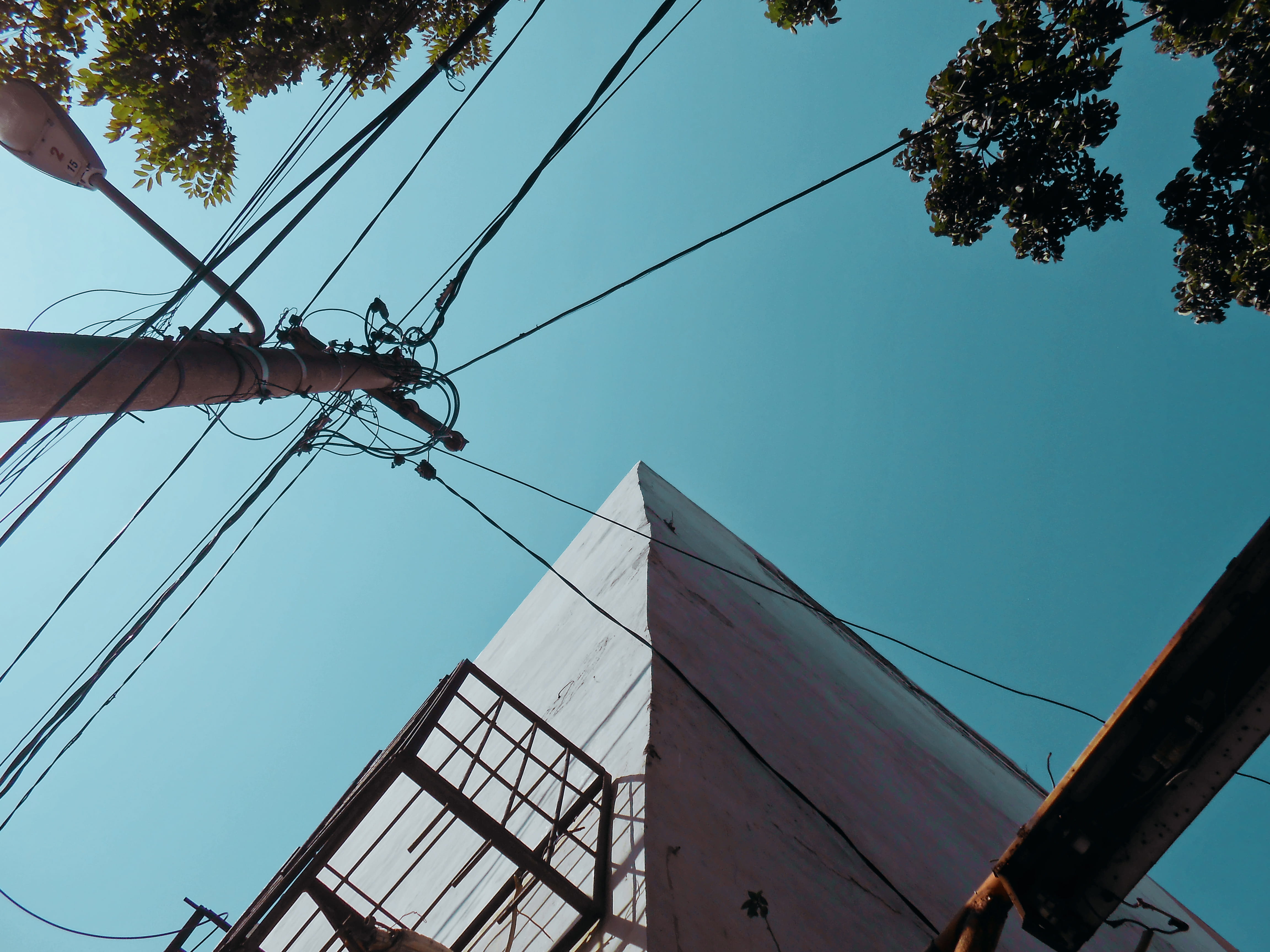 power line, electricity pylon, technology, low angle view, architecture, pole, built structure, outdoors, blue, day, surface, electricity, connection, lines, HD Wallpaper