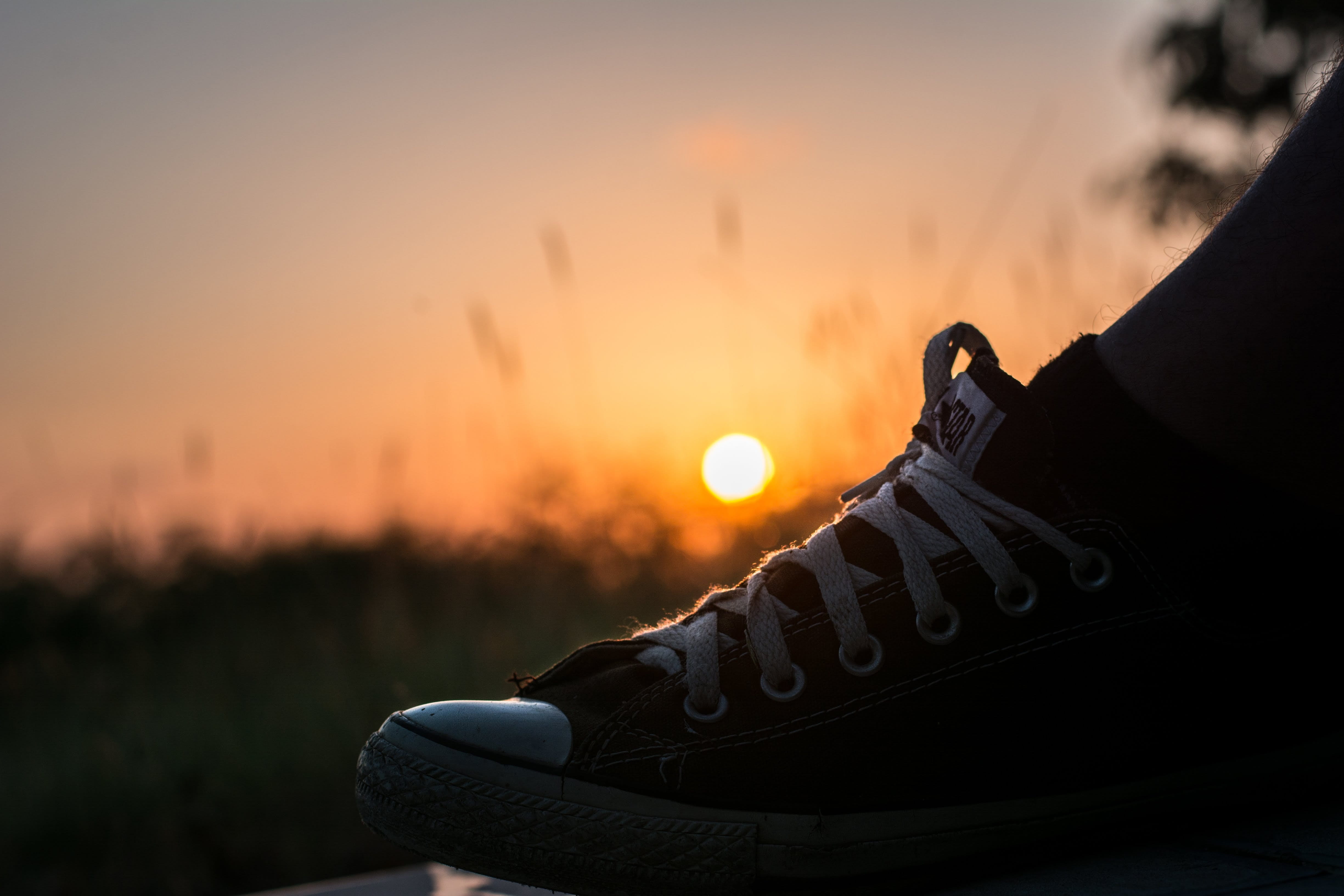 sky, relaxation, plants, tourism, output sun, human leg, black color, focus on foreground, sunrise landscape, adult, nature, human limb, tire, body part, HD Wallpaper
