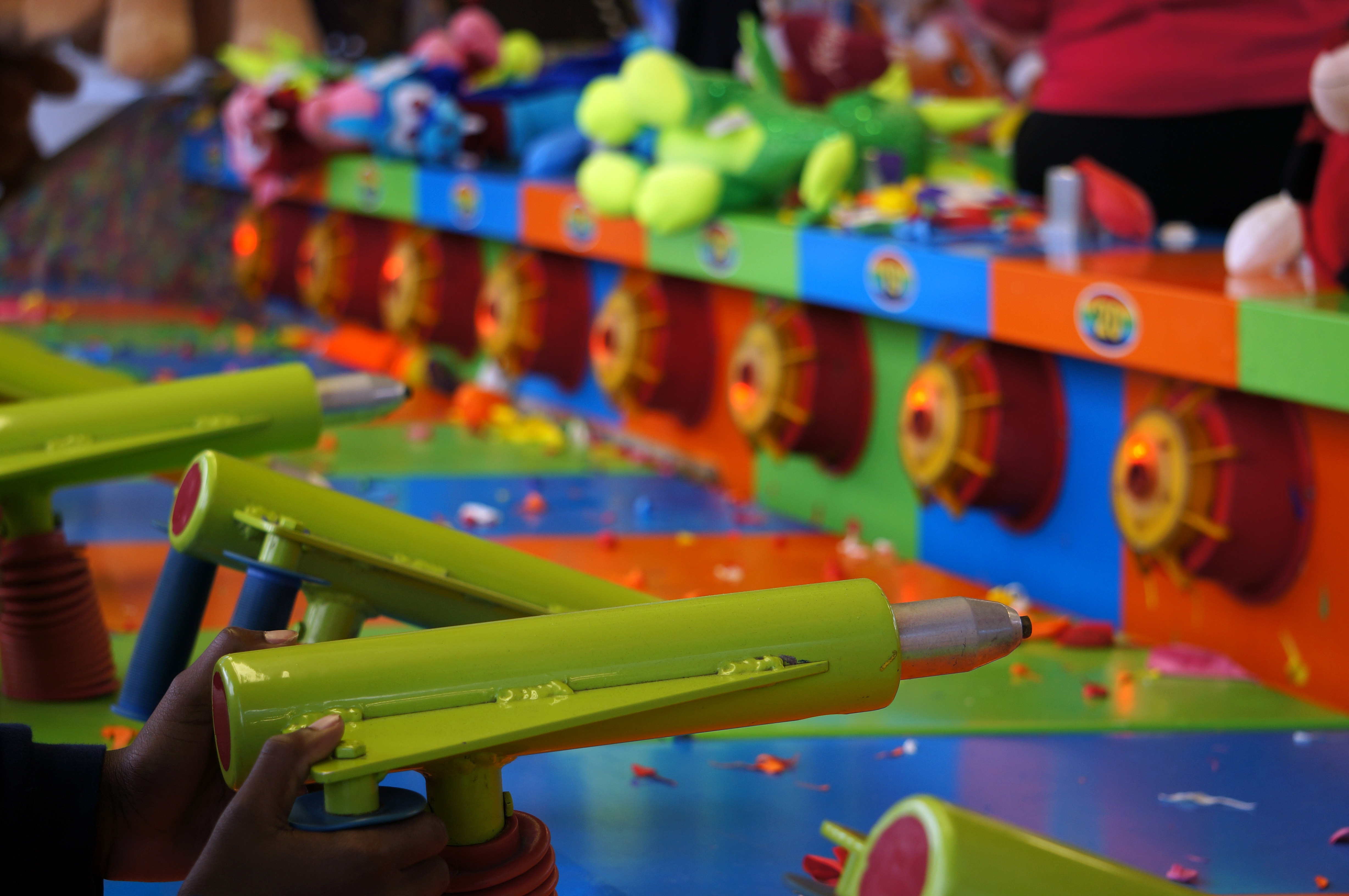 midway, play, hand, amusement, arts culture and entertainment, carnival, colorful, art and craft, park, aim, 4K, fun, childhood, stuffed animal, human body part, HD Wallpaper
