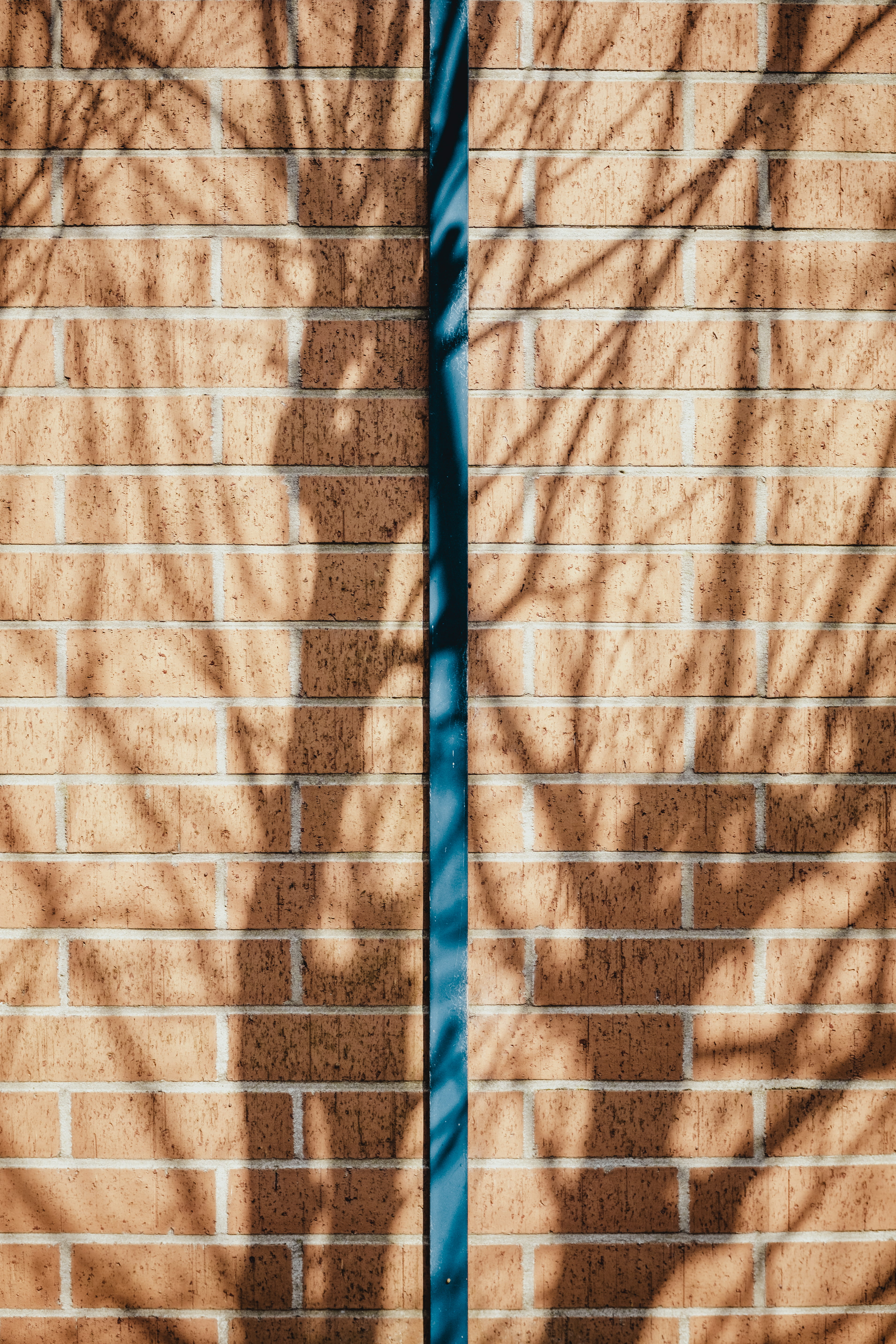 louvain-la-neuve, brick wall, wall - building feature, street, bar, texture, pattern, shadow, day, tablet, wall, building exterior, close-up, symmetry, Phone HD Wallpaper