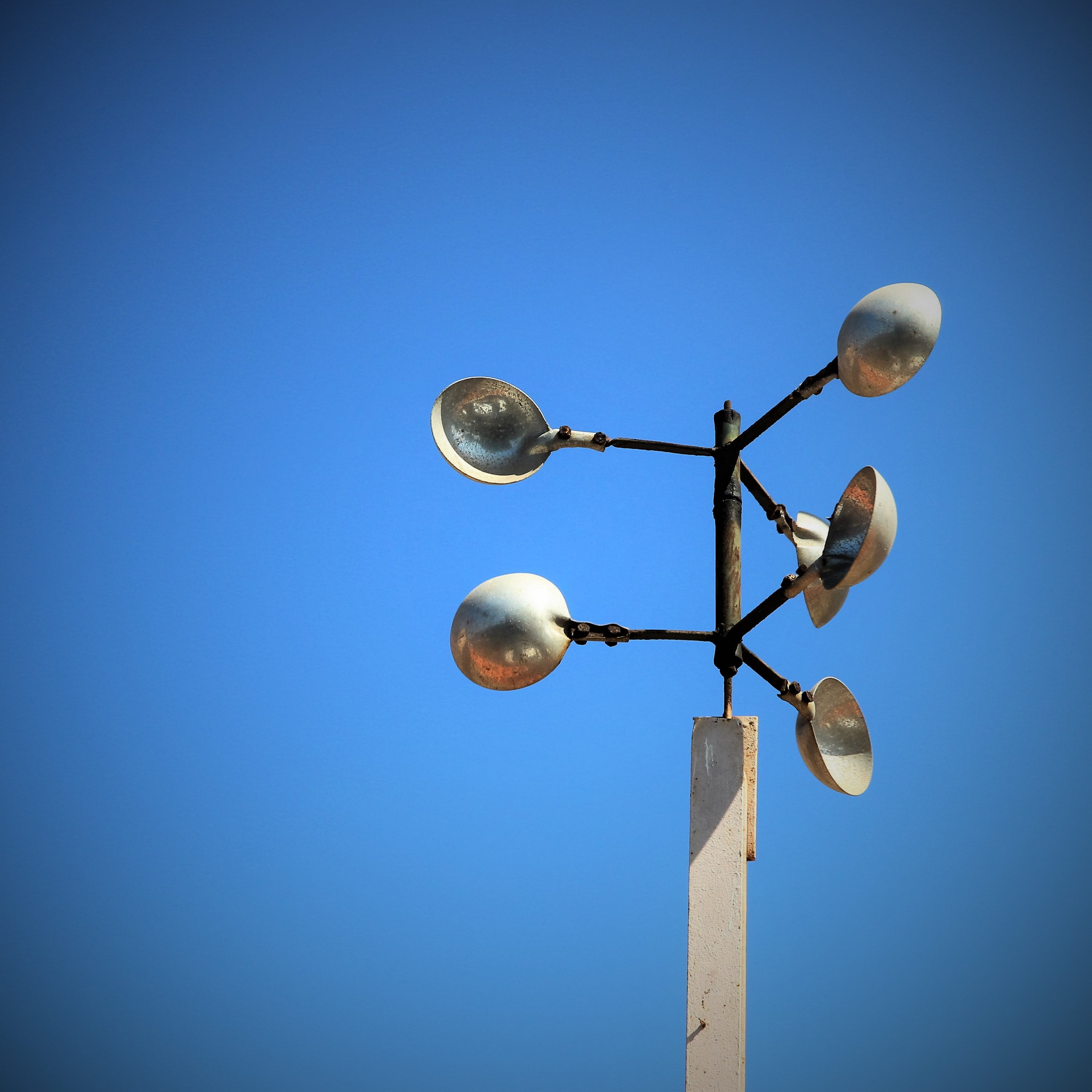 metal, tenerife, music, weather, sky, nature, weather vane, speaker, communication, no people, electric Lamp, 2K, sunlight, technology, trowel, blue, pinwheel, Phone HD Wallpaper
