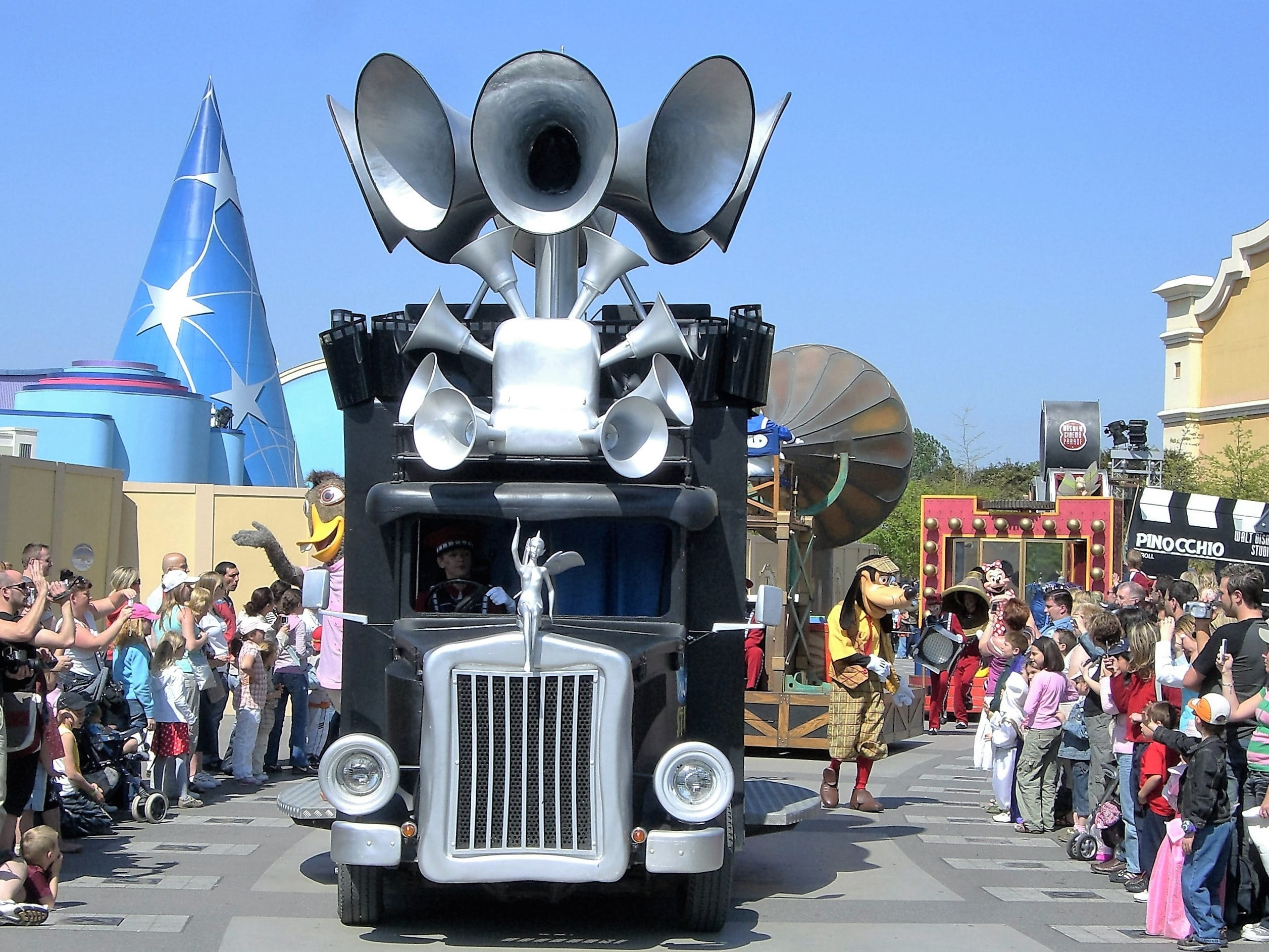 sunlight, street, disney, travel, parade, large group of people, crowd, road, city, sky, day, real people, nature, megaphone, transportation, land vehicle, HD Wallpaper