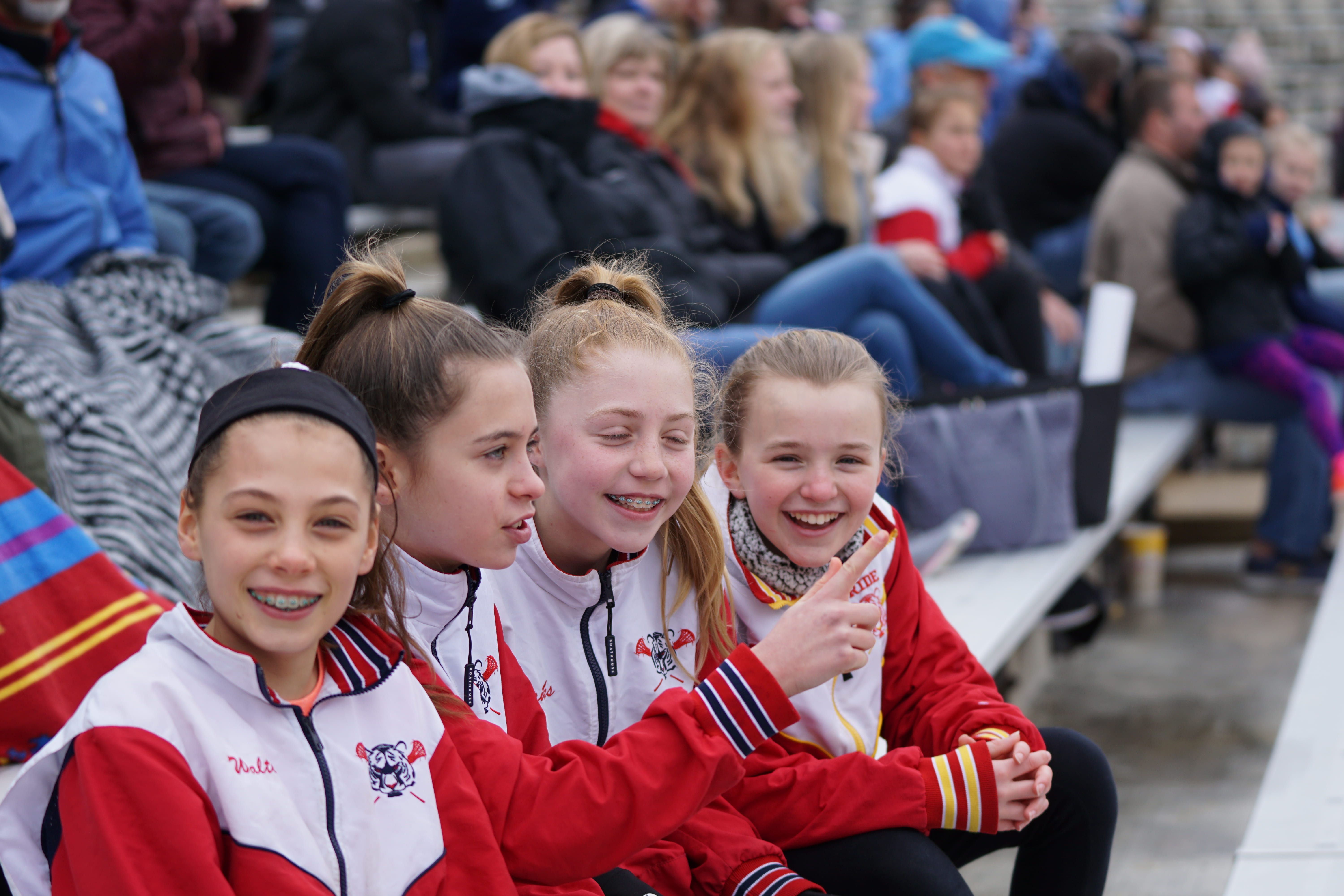 sitting, audience, portrait, smiling, crowd, leisure activities, finger, men, uniform, 5K, offspring, girls, focus on foreground, trademark, clothing, HD Wallpaper