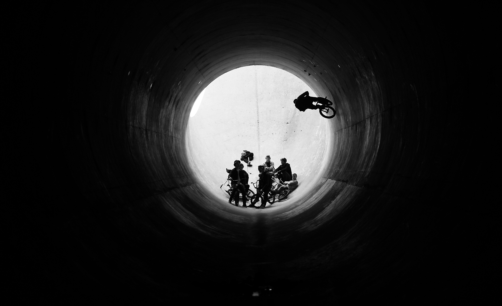 bmx, tunnel, indoors, leisure activity, lifestyle, group of people, 1080P, architecture, silhouette, tour, highway, group, circle, activity, underground, HD Wallpaper