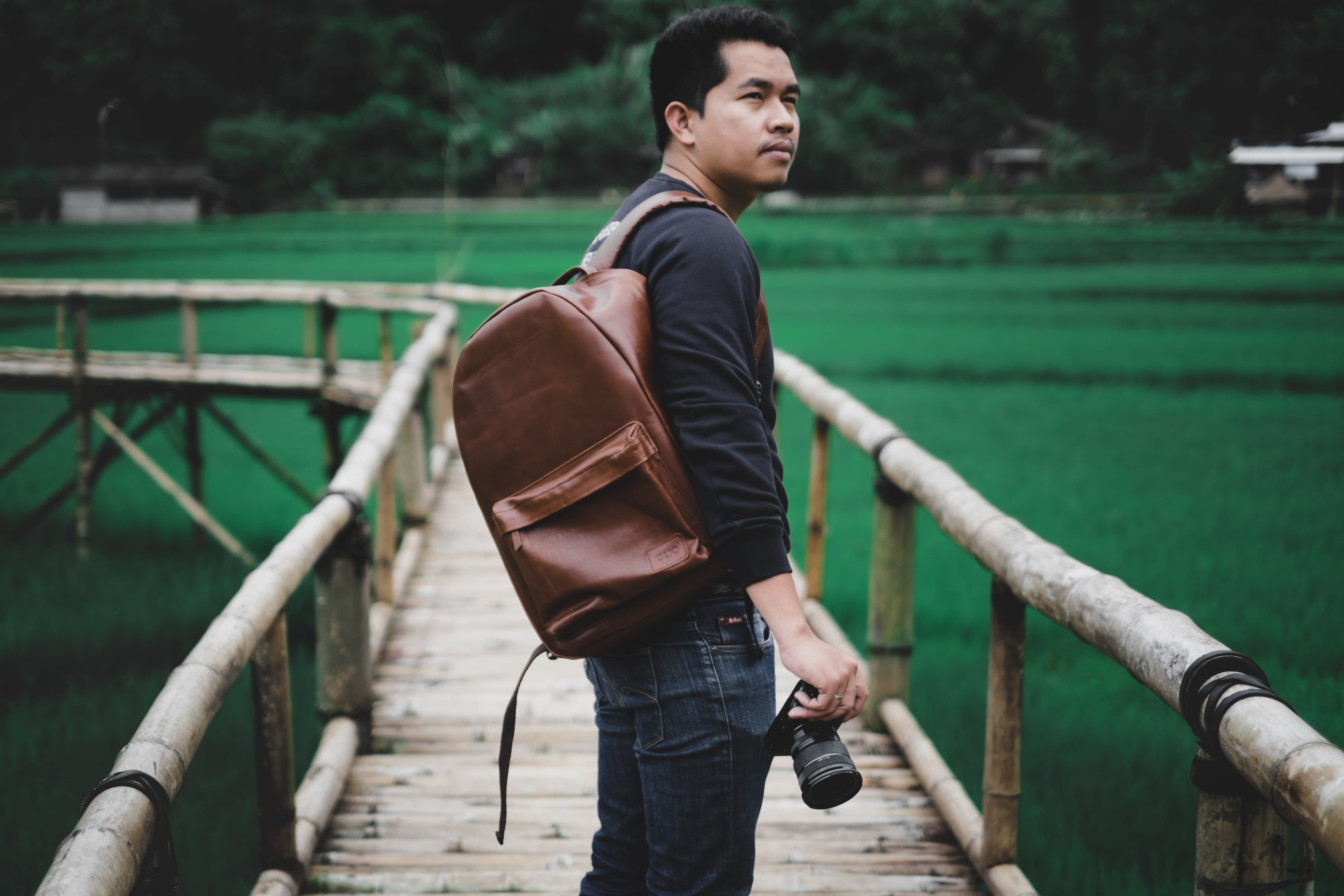 railing, platform, outdoors, focus on foreground, bag, photography, shallow, side view, real people, young adult, males, three quarter length, one person, HD Wallpaper