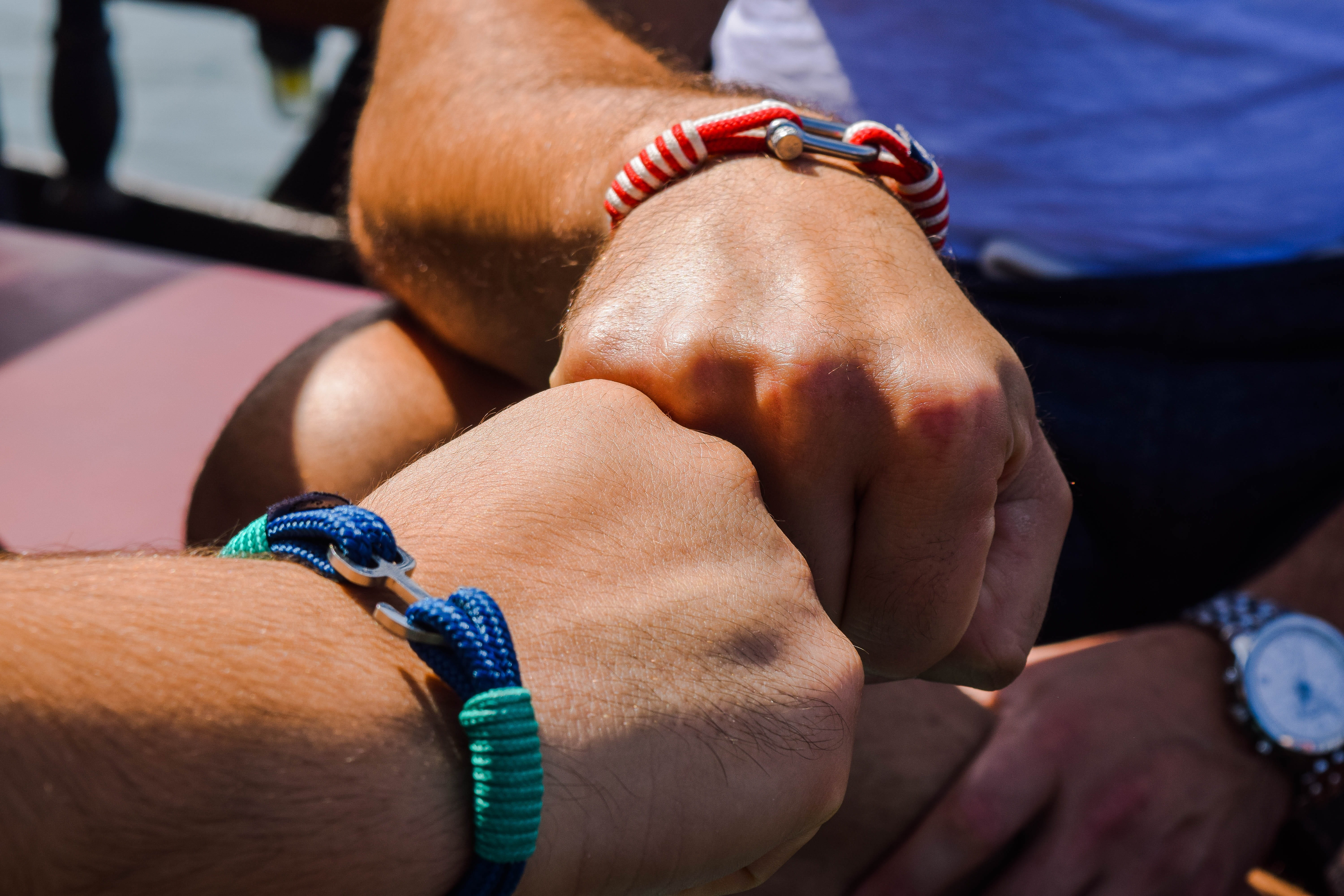 two people, real people, skin, people, men, greece, women, young adult, person, close-up, hands, close, human hand, day, bump, bonding, bracelets, man, HD Wallpaper