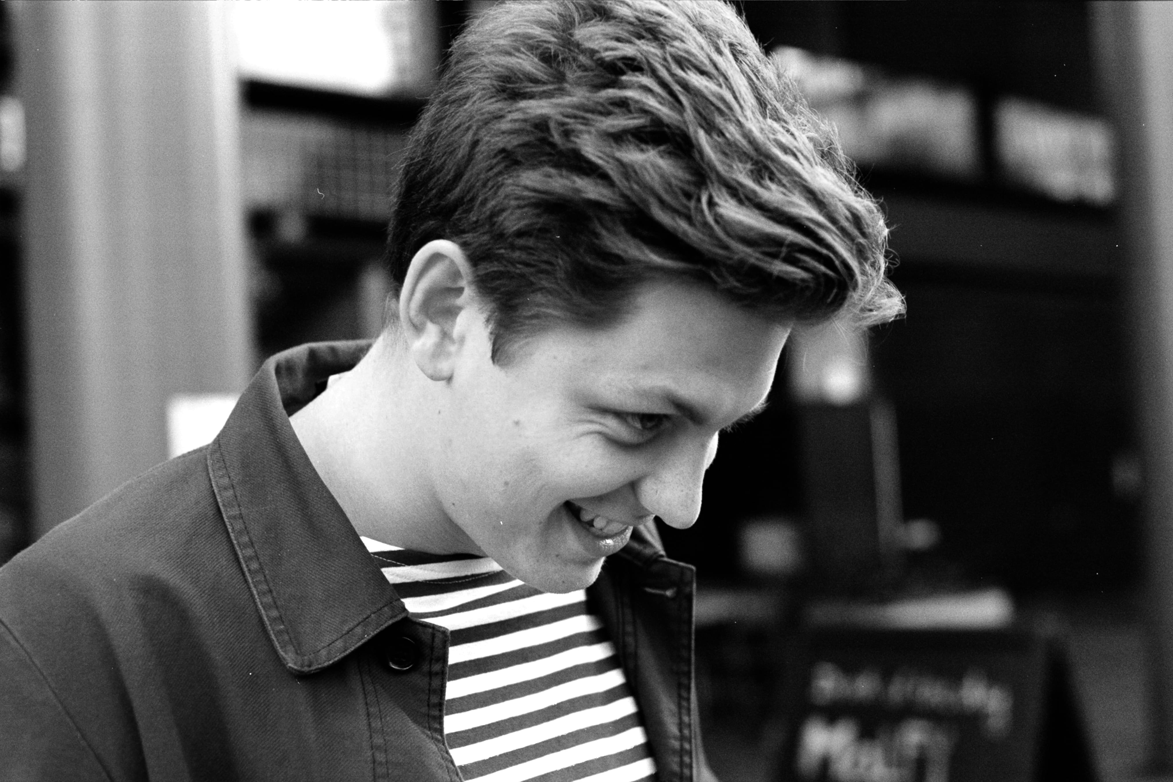 candid, man, united kingdom, leisure activity, focus on foreground, smiling, black and white, london, 35mm, headshot, real people, film photography, front view, HD Wallpaper
