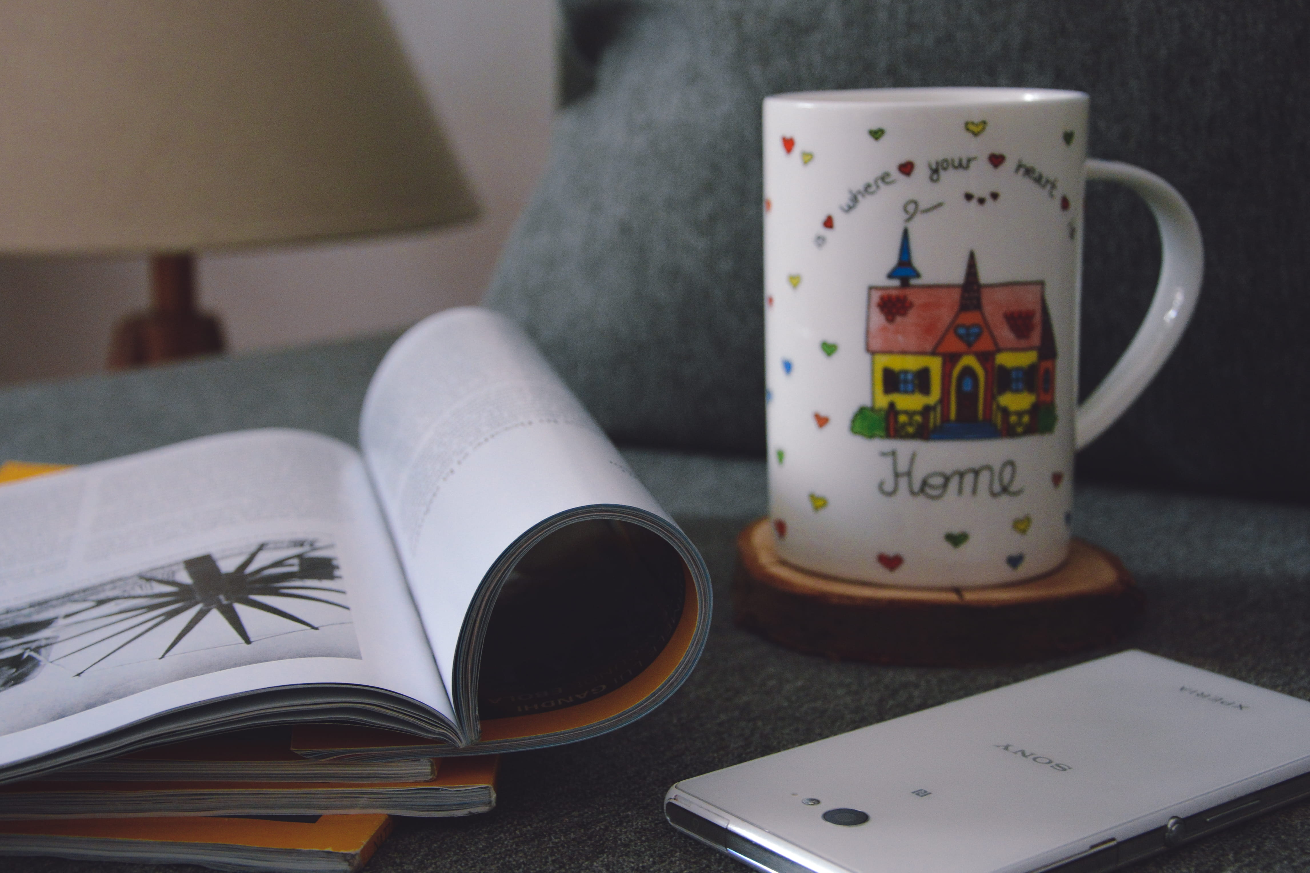 smartphone, table, reading, focus on foreground, tea cup, relaxing, refreshment, indoors, no people, close-up, home, sofa, 4K, mug, western script, food and drink, HD Wallpaper