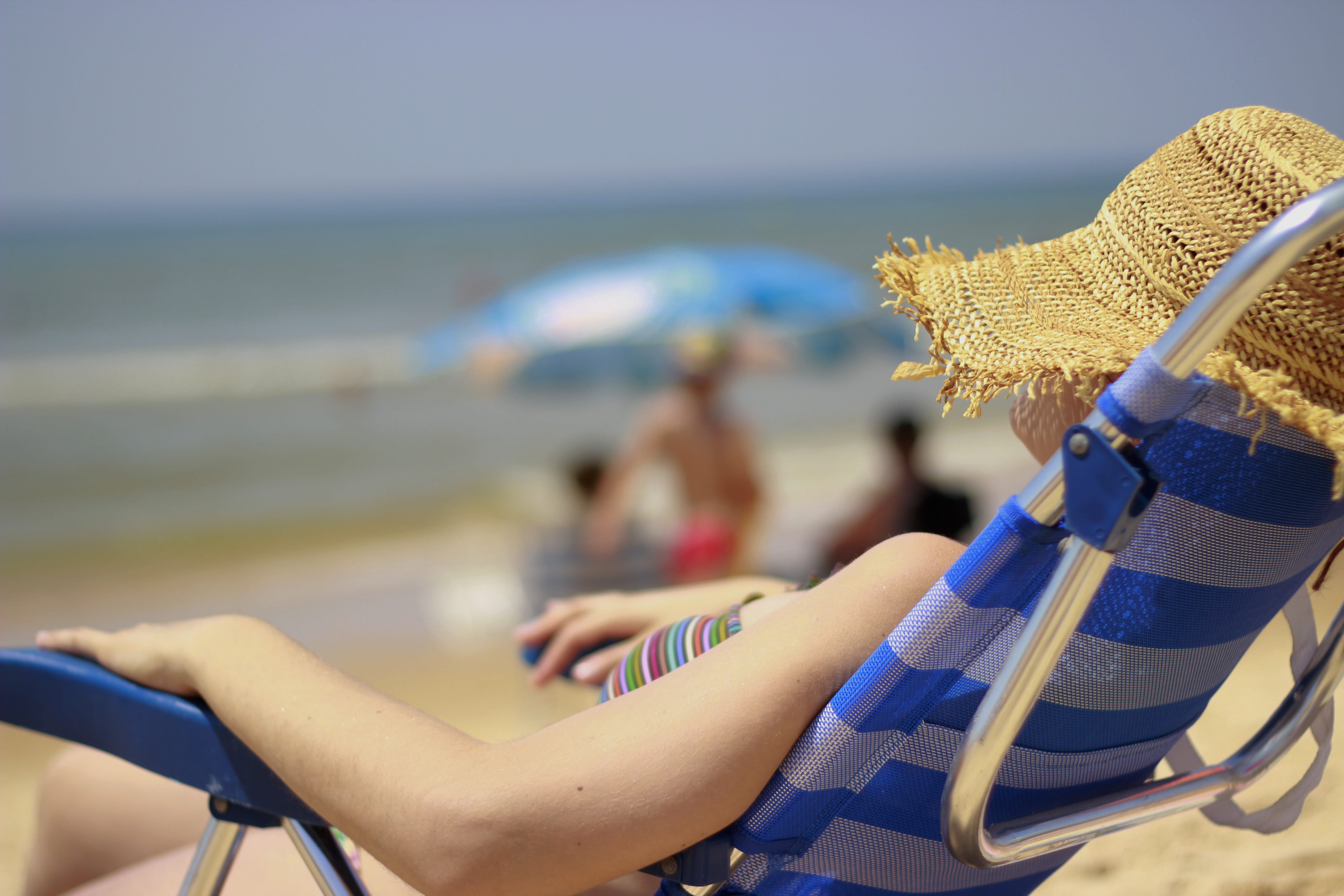 holiday, 5K, trip, blue, beach, hat, nature, clothing, vacations, water, leisure activity, horizon over water, lounger, woman, focus on foreground, land, HD Wallpaper