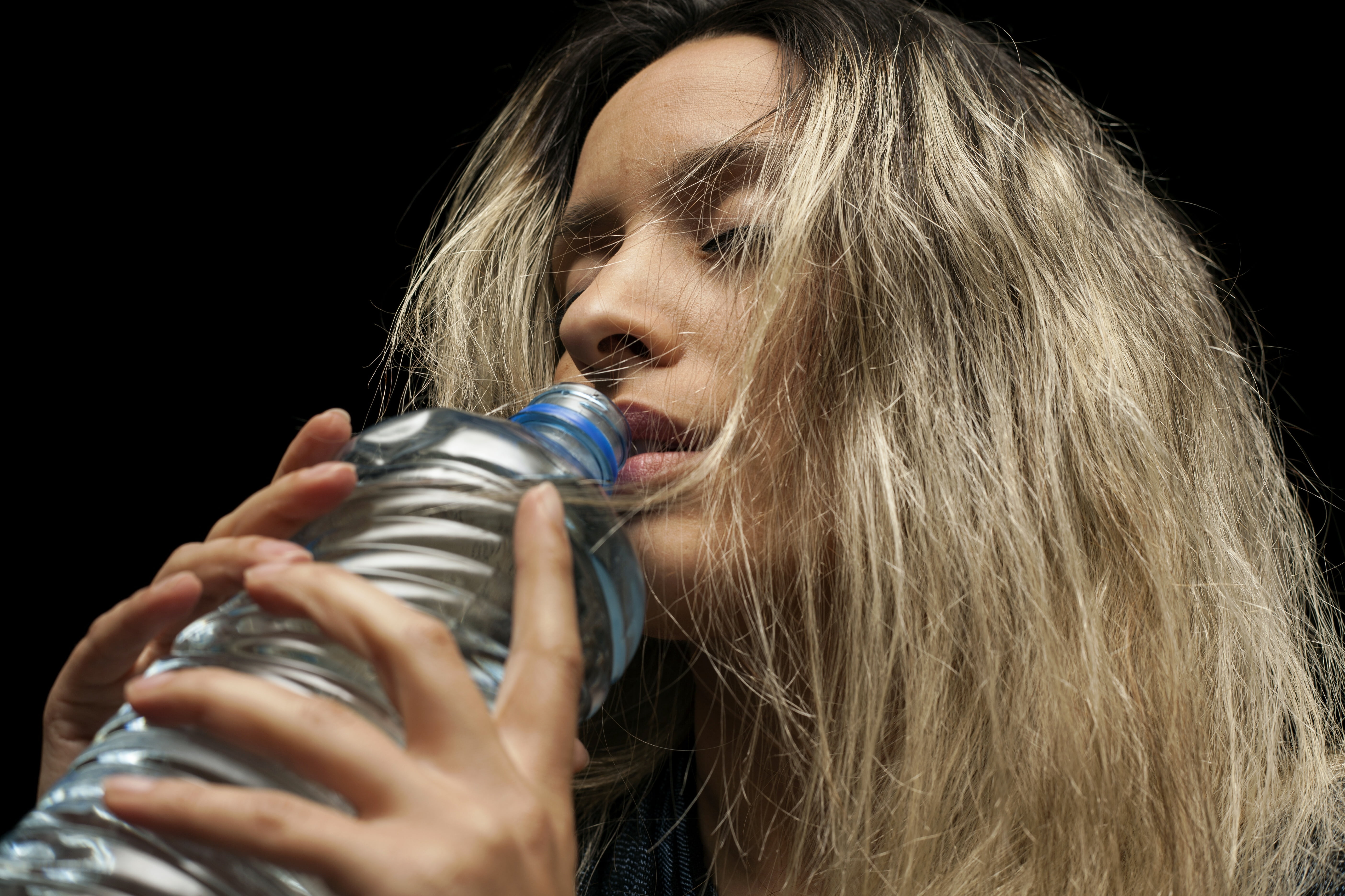 young, people, live, singer, health, beautiful, life, mid adult, black background, photography, fiction, young model, blond hair, thirsty, healthy, breath, HD Wallpaper