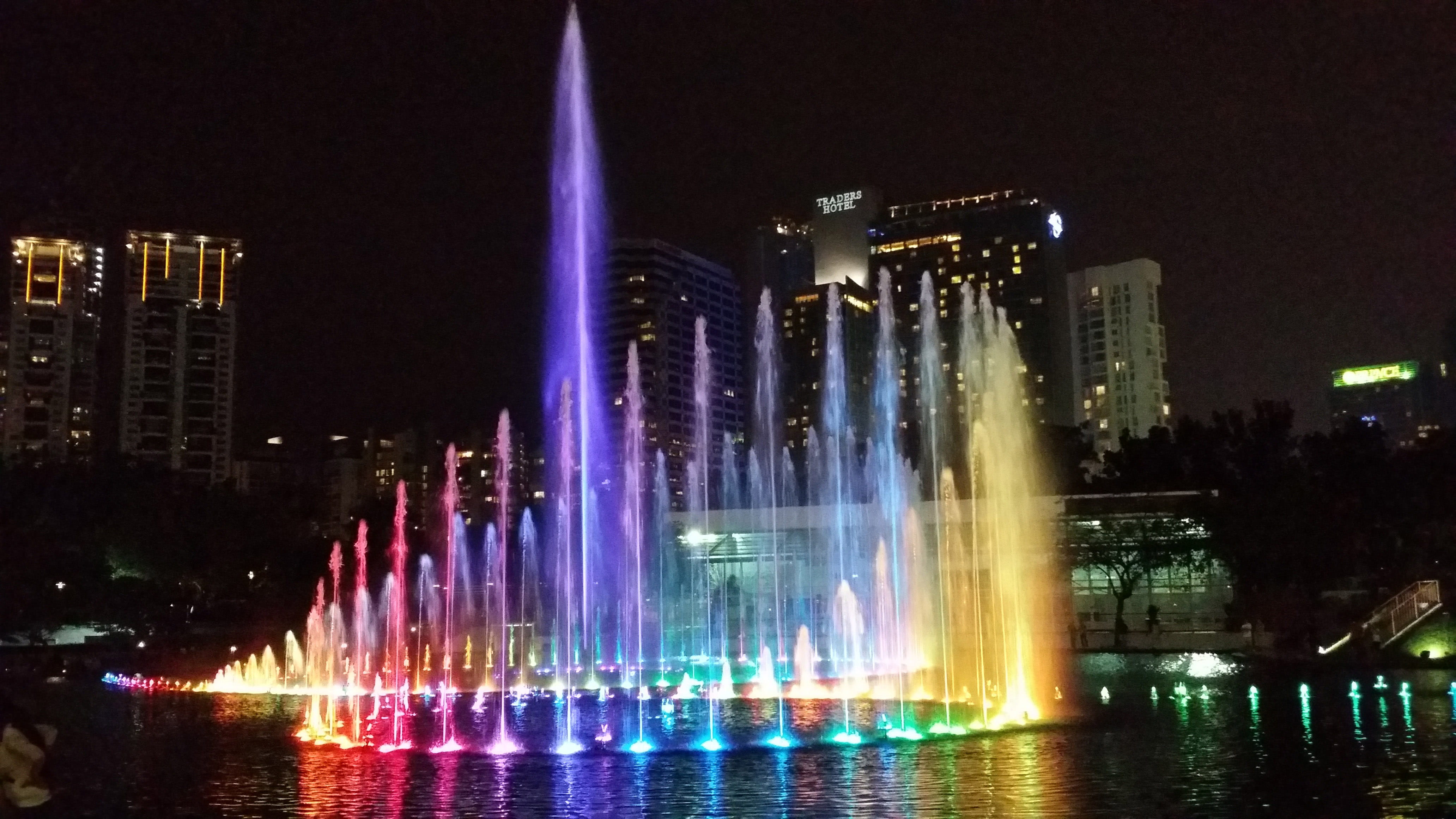 skyscraper, waterfront, illuminated, city, reflection, travel Destinations, night, building, Kuala Lumpur, spraying, motion, famous Place, outdoors, flowing water, HD Wallpaper