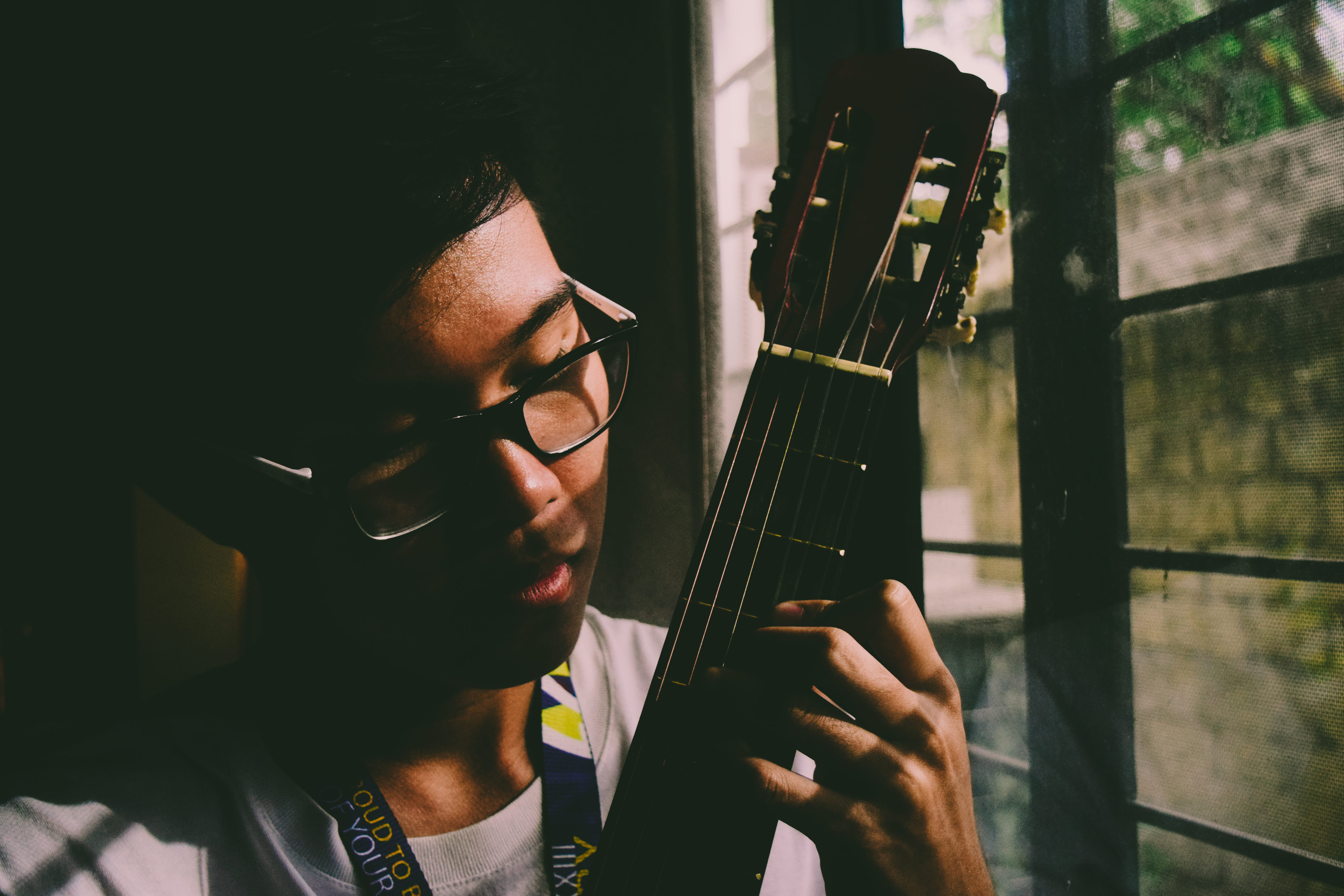 one person, student, dark, glasses, near, performer, close-up, eyeglasses, string instrument, photo, men, play, man, window, 5K, indoors, young men, guitar, HD Wallpaper