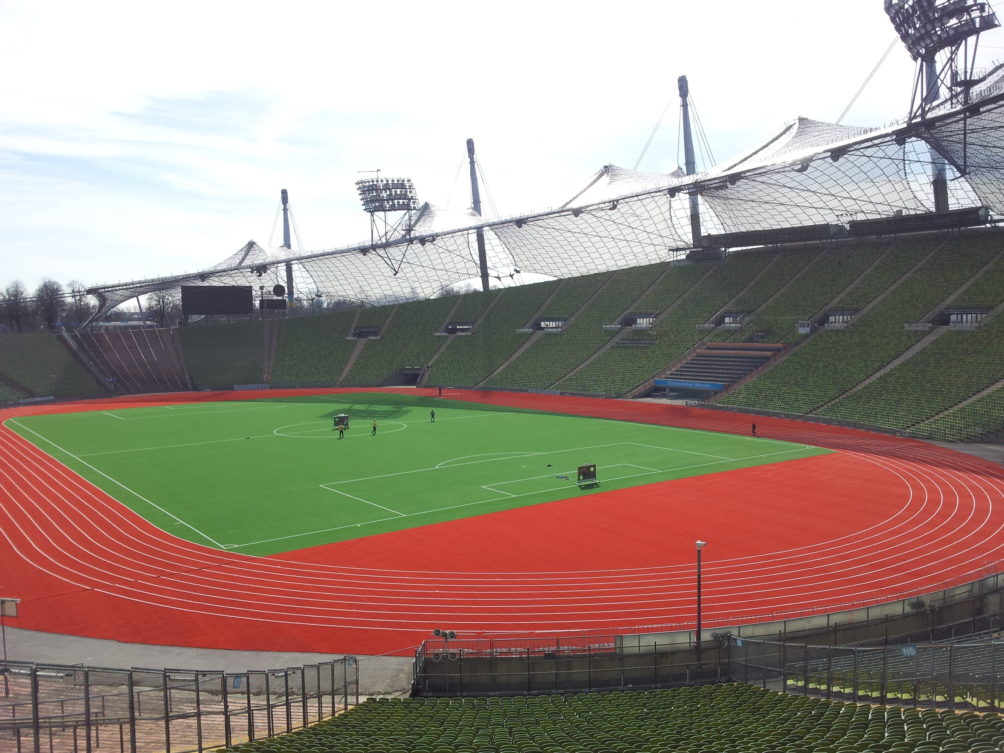 red, no people, football stadium, grandstand, day, team sport, stadium, munich, 2K, olympia, building exterior, football, olympic stadium, playing field, HD Wallpaper