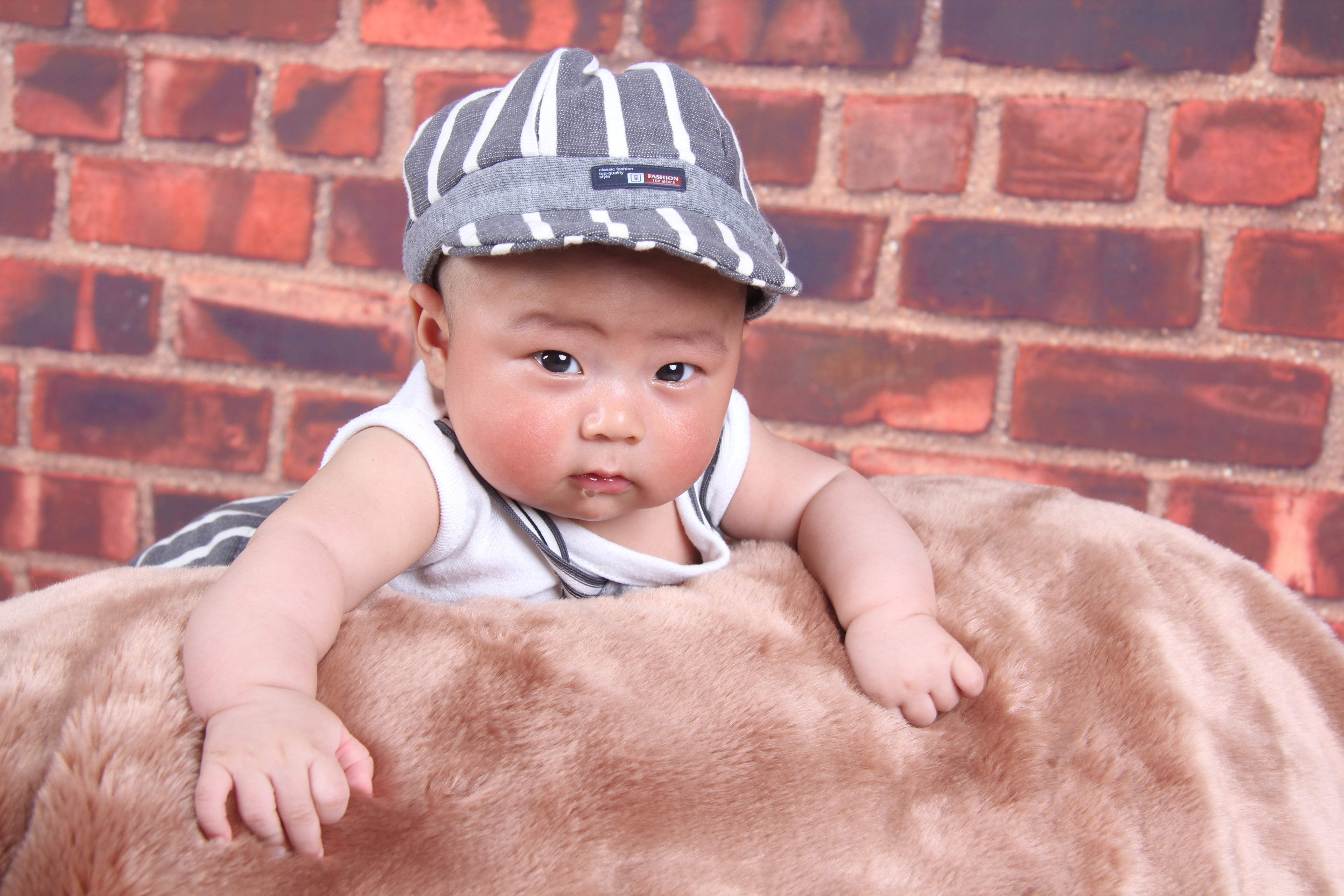suckling, kid, brick wall, real people, bundle of joy, happy, baby, young, clothing, infant, brick, little lump of sweetness, one person, day, boy, plush, HD Wallpaper