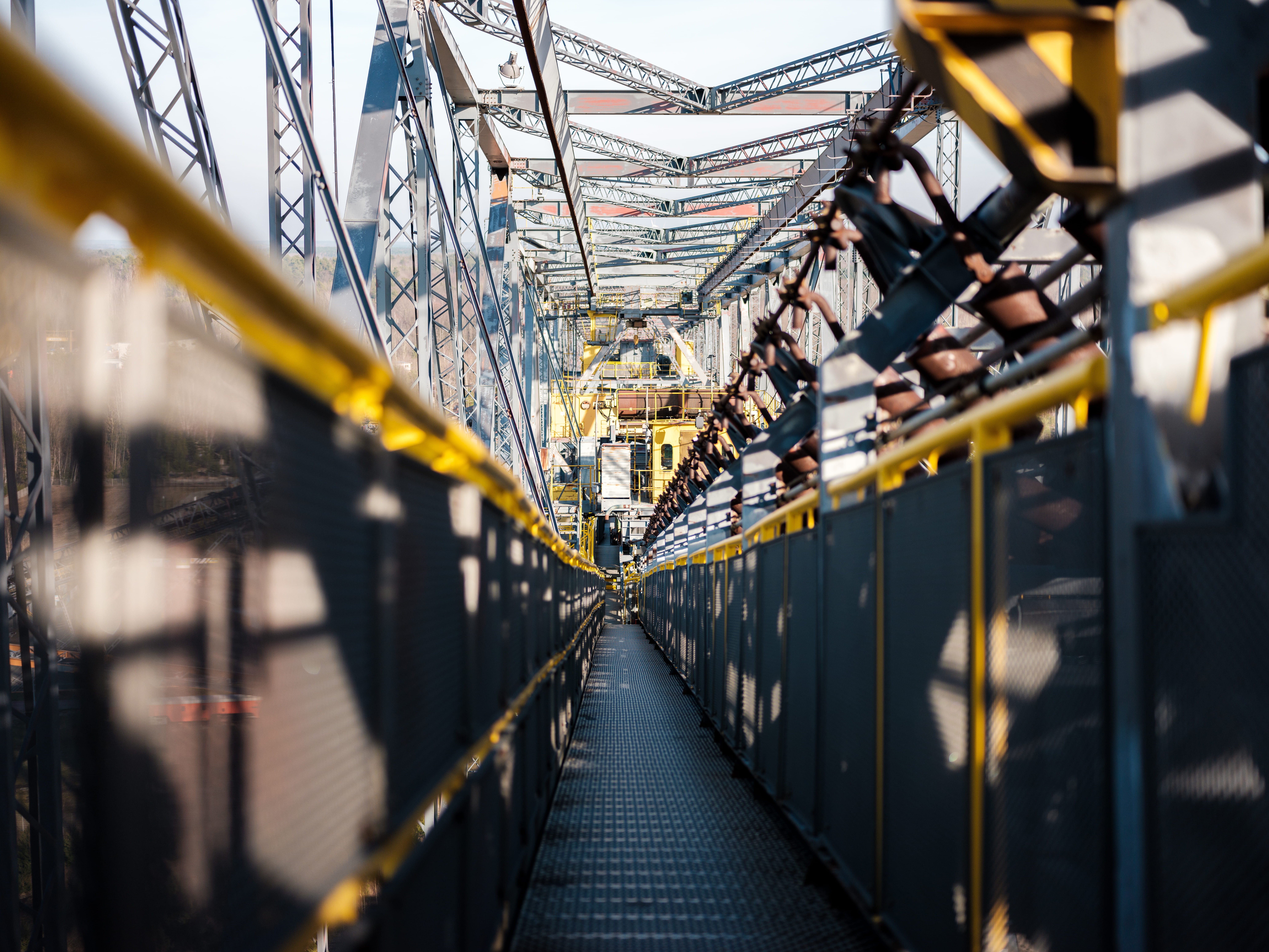 day, travel, corridor, selective focus, built structure, braunkohle, handrail, warehouse, vehicle, no people, bridge, text, yellow, metal, direction, diminishing perspective, HD Wallpaper