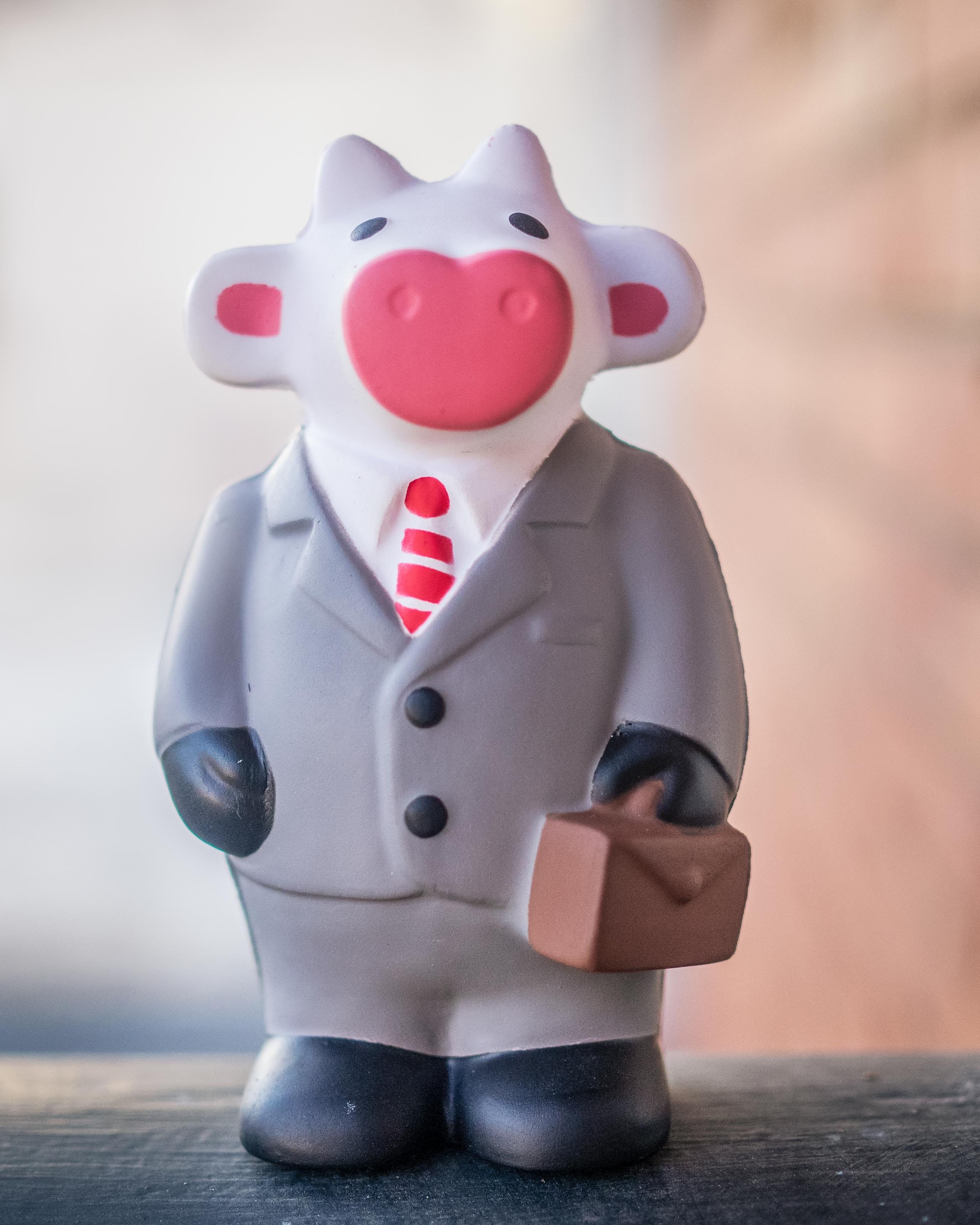 day, overcoat, suit, red, barbie, art and craft, way, 2K, figurine, doll, table, outdoors, plastic, creativity, briefcase, close-up, road, apparel, cow, Phone HD Wallpaper