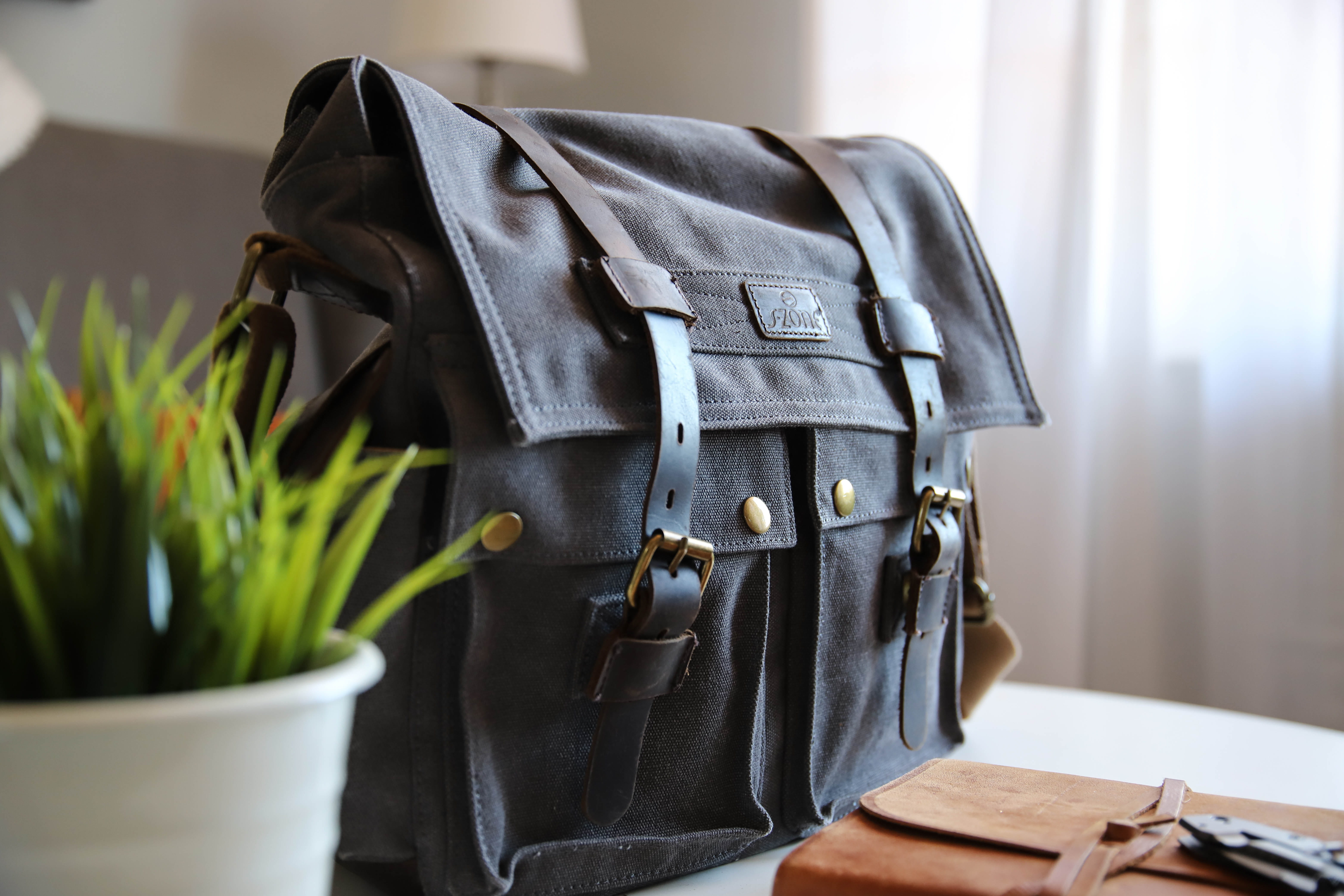briefcase, satchel, accessories, jar, potted plant, selective focus, messenger bag, pottery, vase, day, still life, lynchburg, close-up, indoors, black, HD Wallpaper