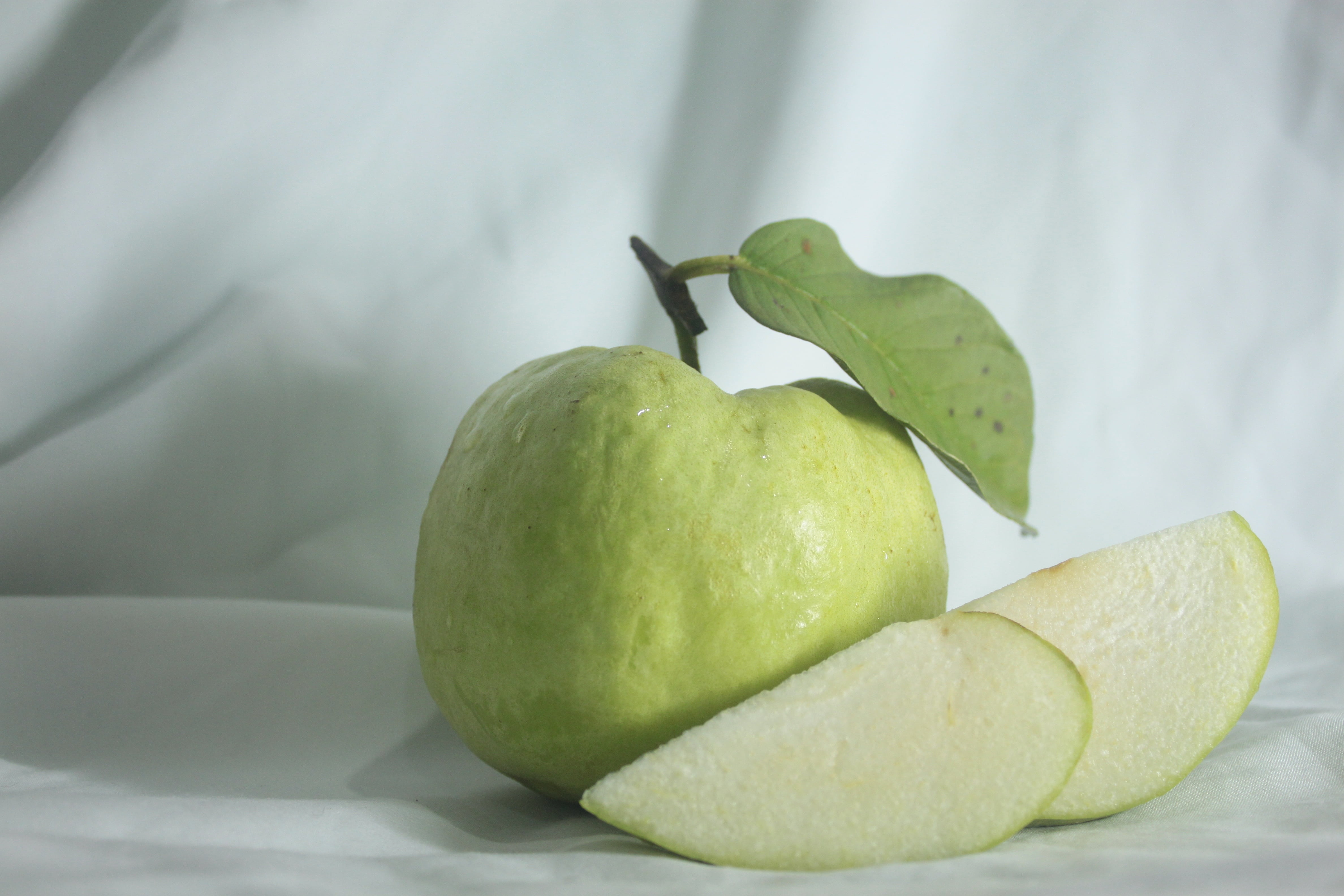 surface, focus on foreground, close-up, white, apple, ripe, sliced, shadow, leaf, indoors, fruit, 4K, no people, food, still life, healthy eating, granny smith apple, HD Wallpaper