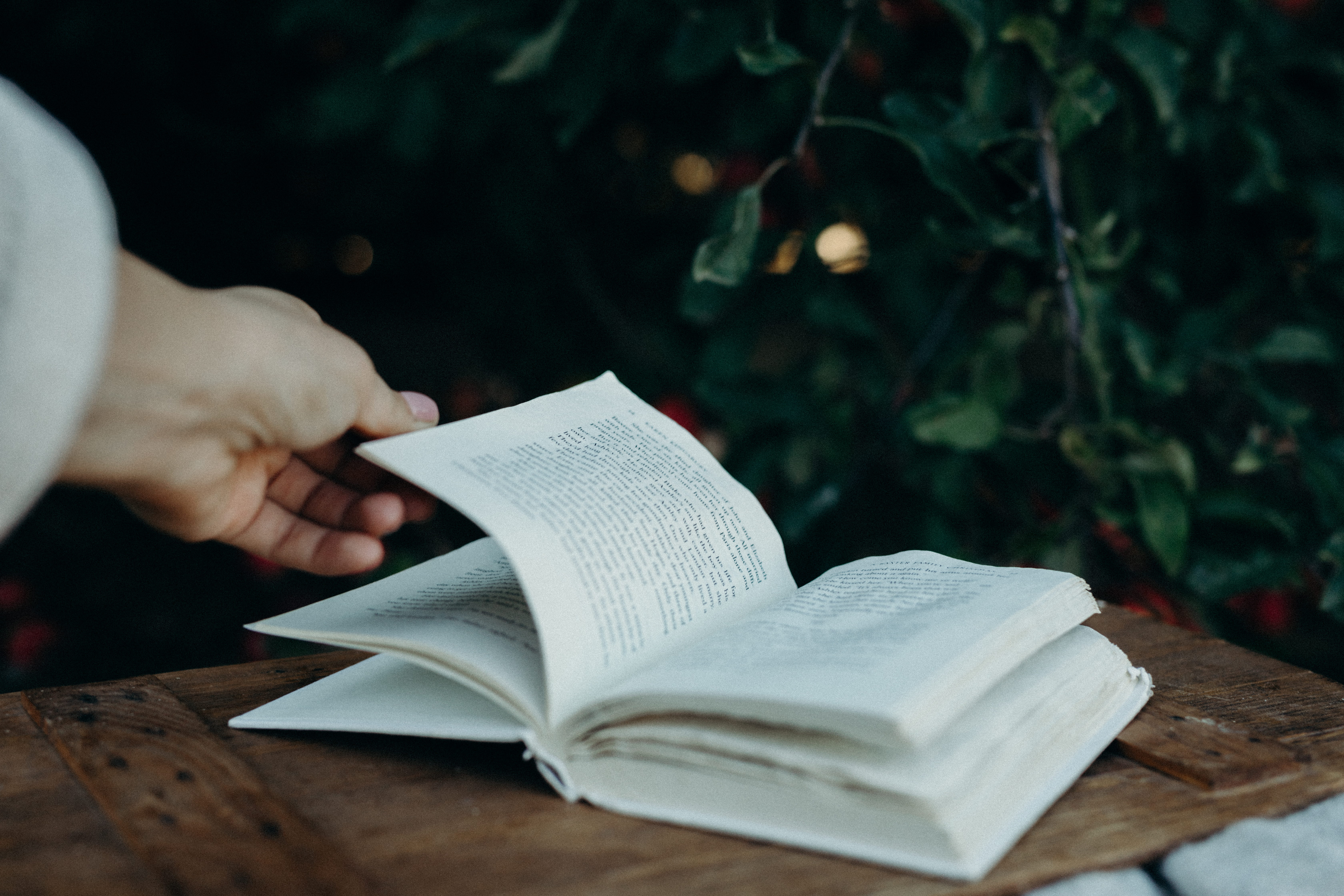 page, wooden, read, tree, text, table, caucasian, wood - material, finger, publication, garden, picnic, opened, apple, white, lifestyles, book, adult, hand, HD Wallpaper