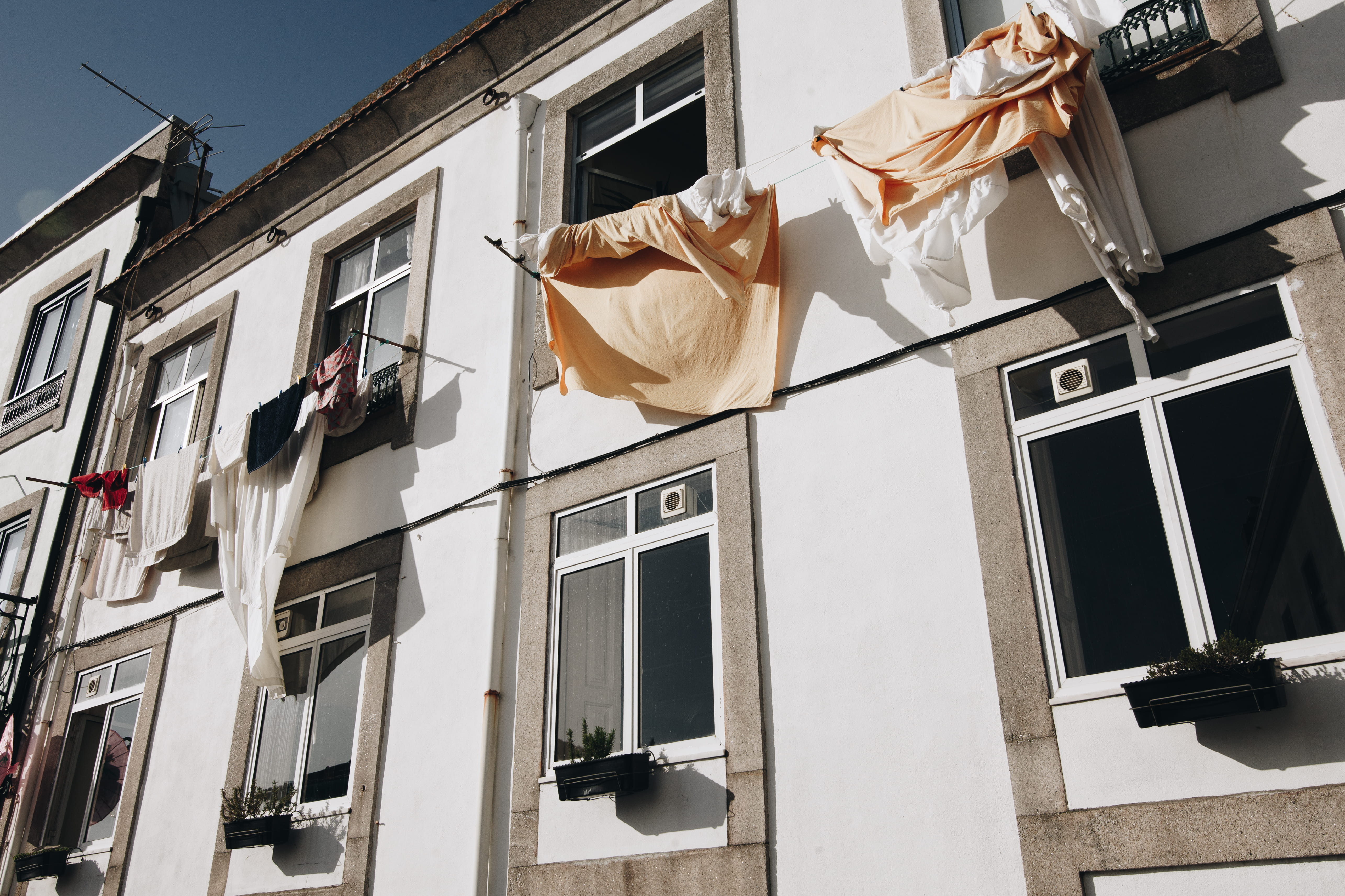 business, laundry, clothes hanger, city life, hanged, clean, apartment, home, low angle view, facade, street photography, windows, architecture, building exterior, HD Wallpaper