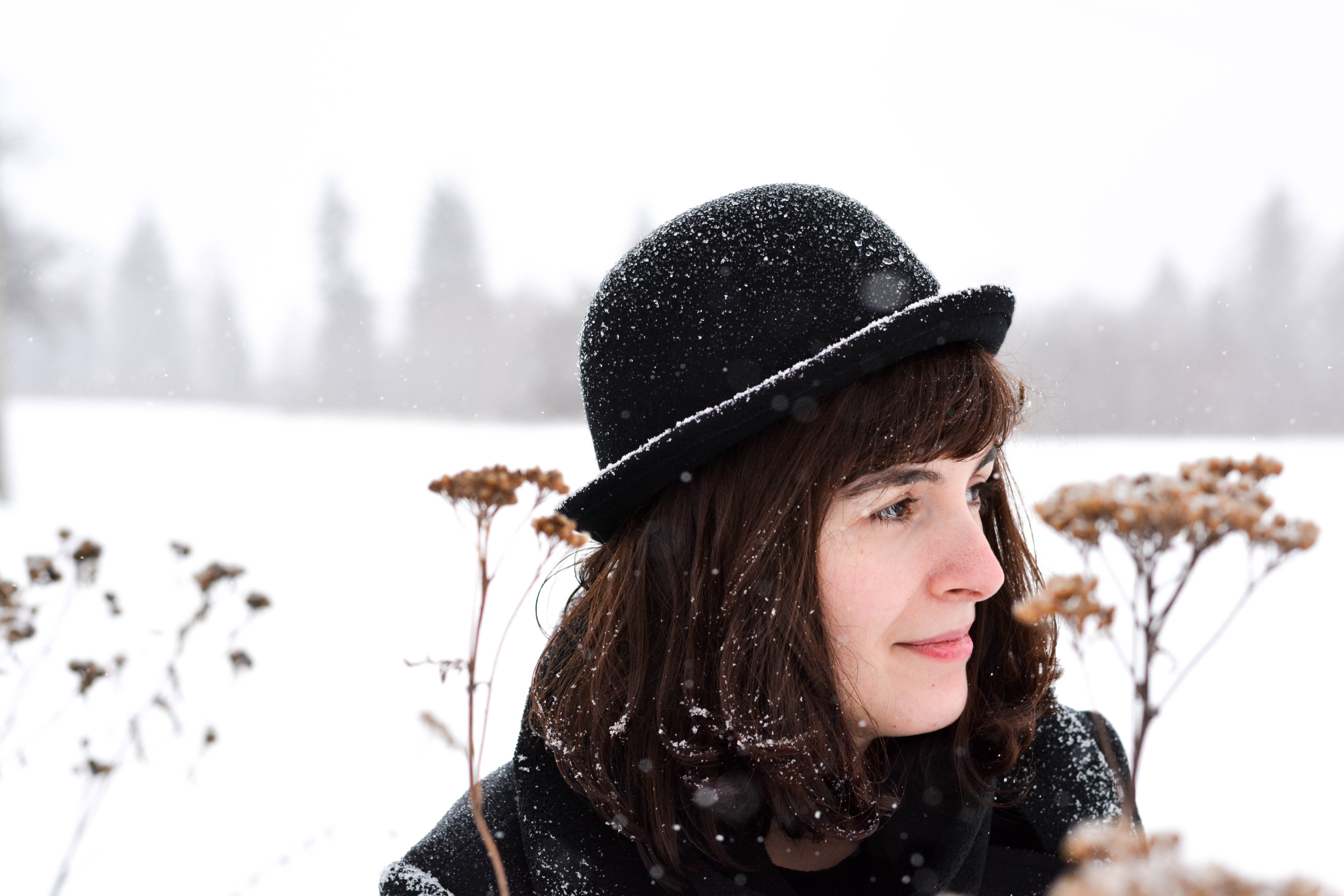portrait, flowers, young women, forest, focus on foreground, real people, headshot, snowing, hair, warm clothing, day, young adult, 5K, hat, cold temperature, HD Wallpaper