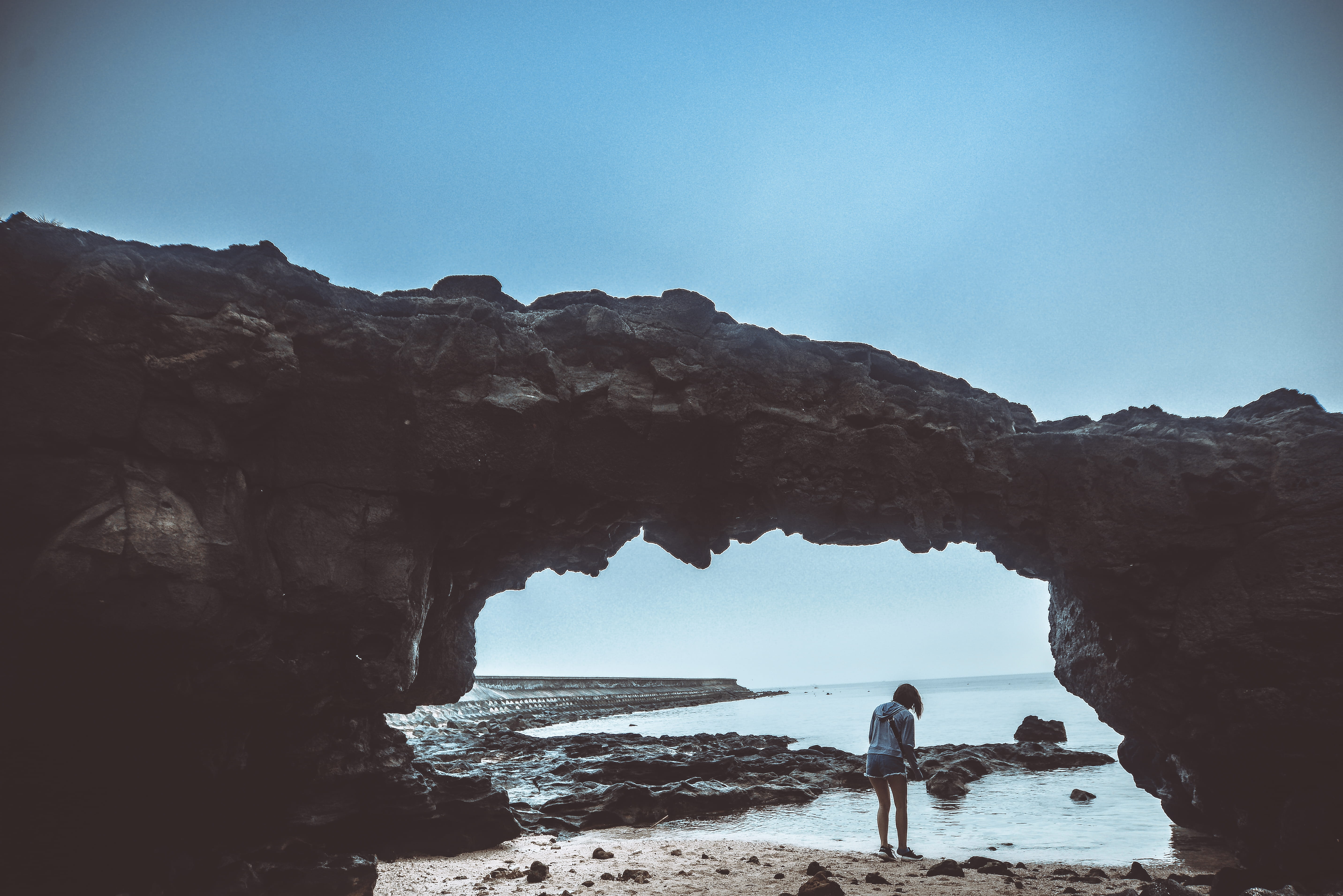 dawn, sea, rock formation, beauty in nature, leisure activity, landscape, seashore, travel, nature, one person, island, holiday, men, mountain, rock, scenic, HD Wallpaper