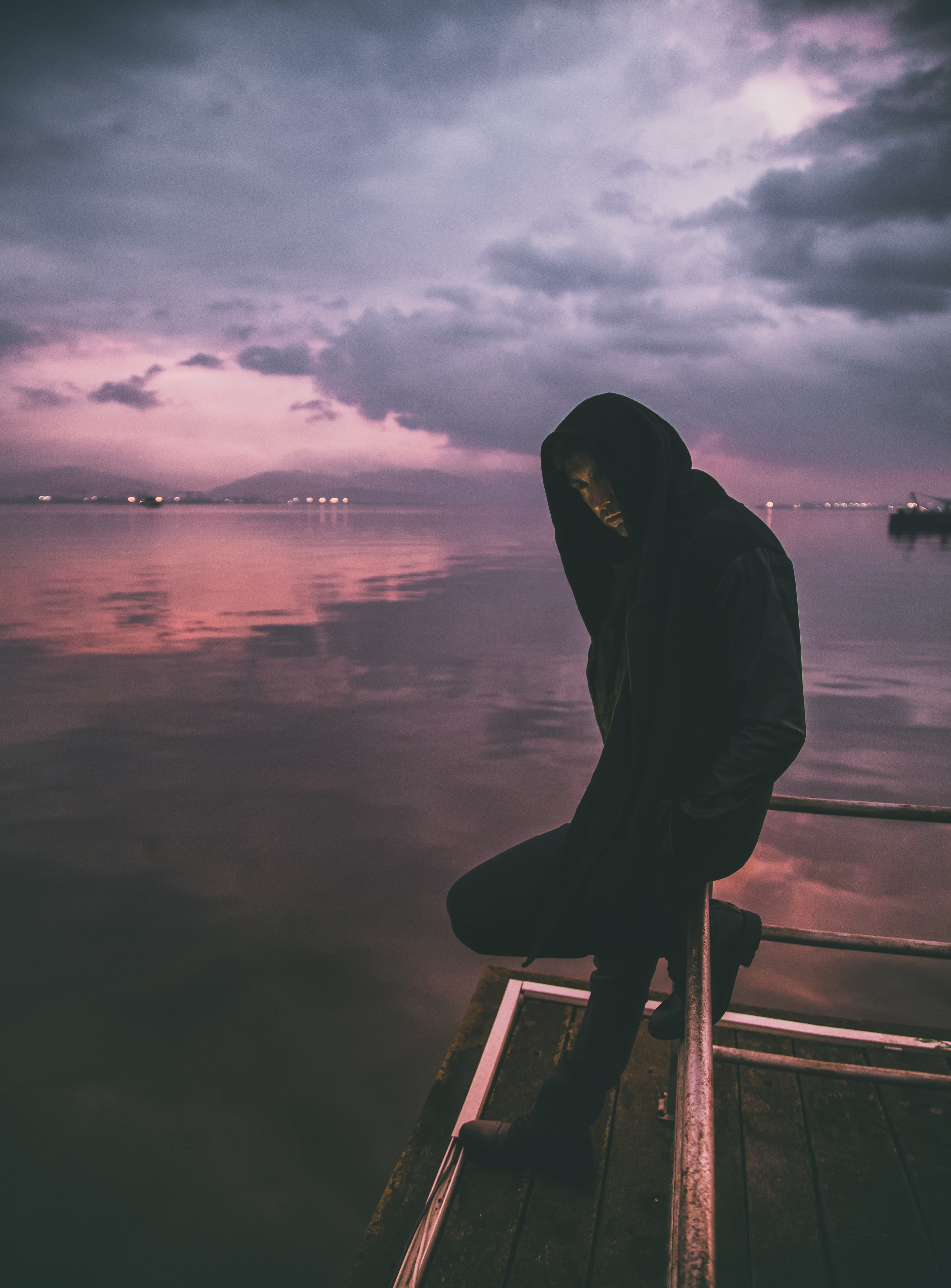 beach, light, one person, clouds, adult, silhouette, lifestyles, lake, reflection, hoodie, travel, outdoors, backlit, pose, evening, beauty in nature, dock, Phone HD Wallpaper