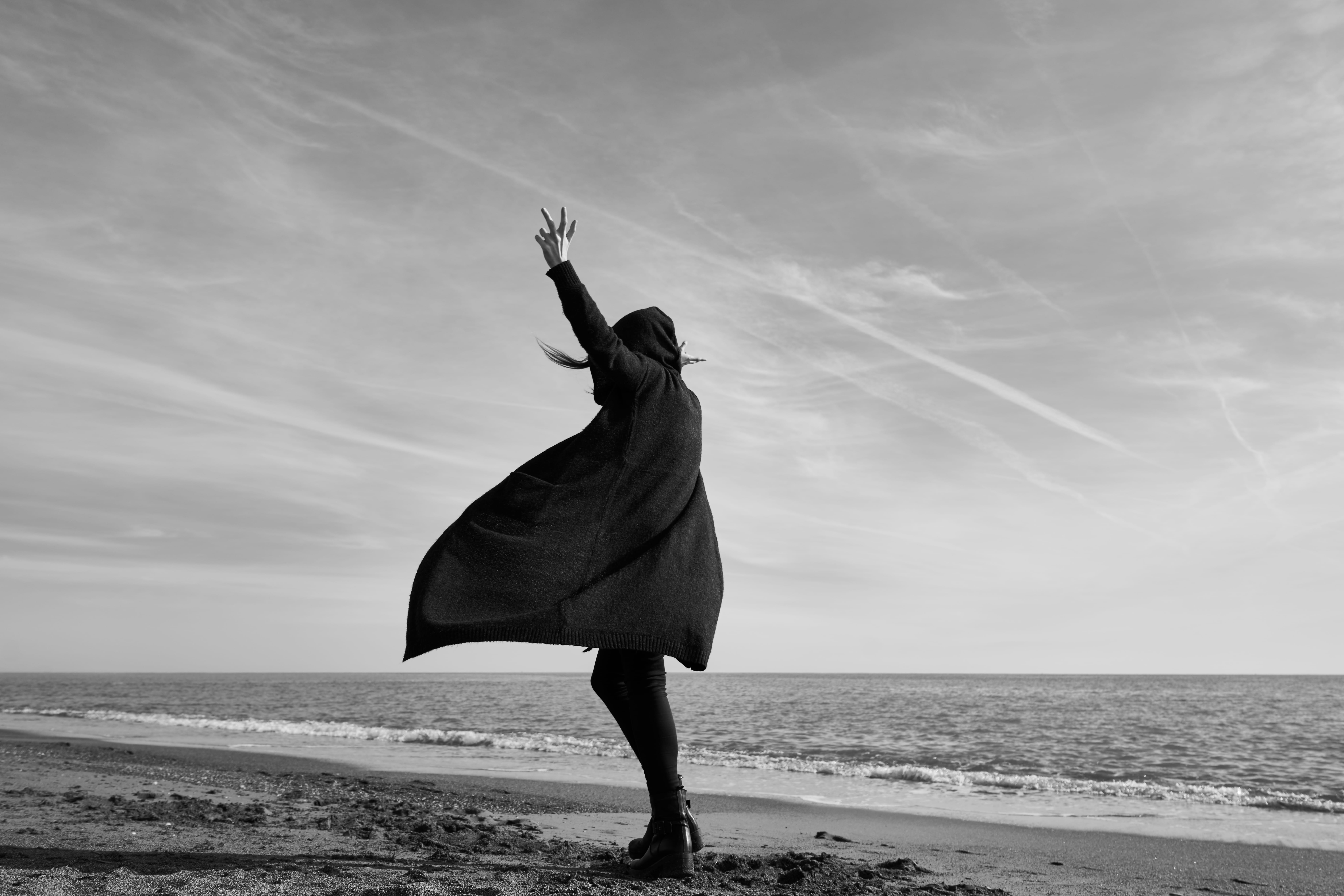 monochrome, conceptual, sadness, horizon over water, full length, scenic, arms raised, wind, fashion, one person, solitude, female, recreation, travel, HD Wallpaper