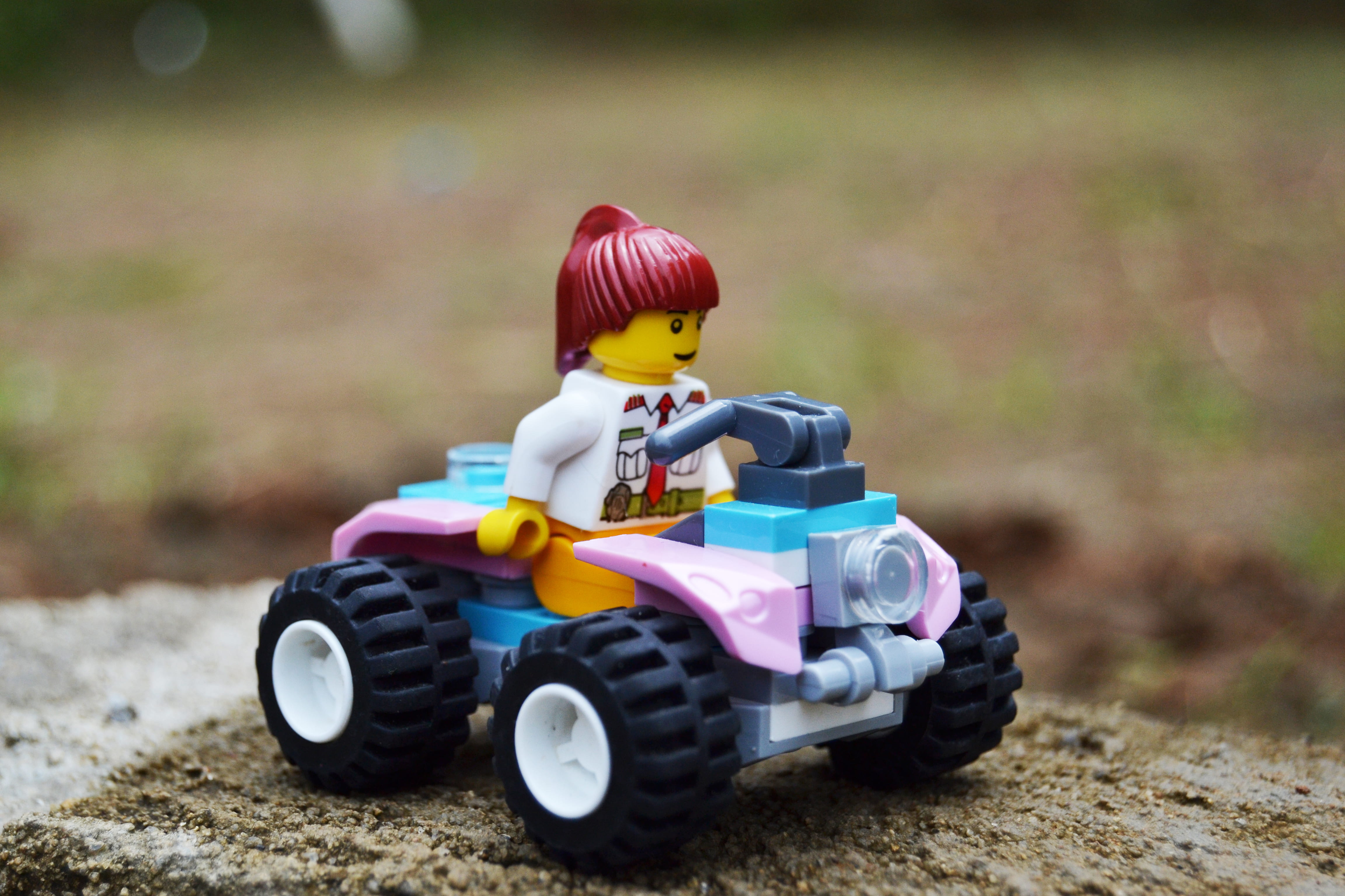 focus on foreground, toy car, transportation, atv, cute, small, child, miniature, full length, petualangan, 4K, mode of transportation, one person, riding, HD Wallpaper