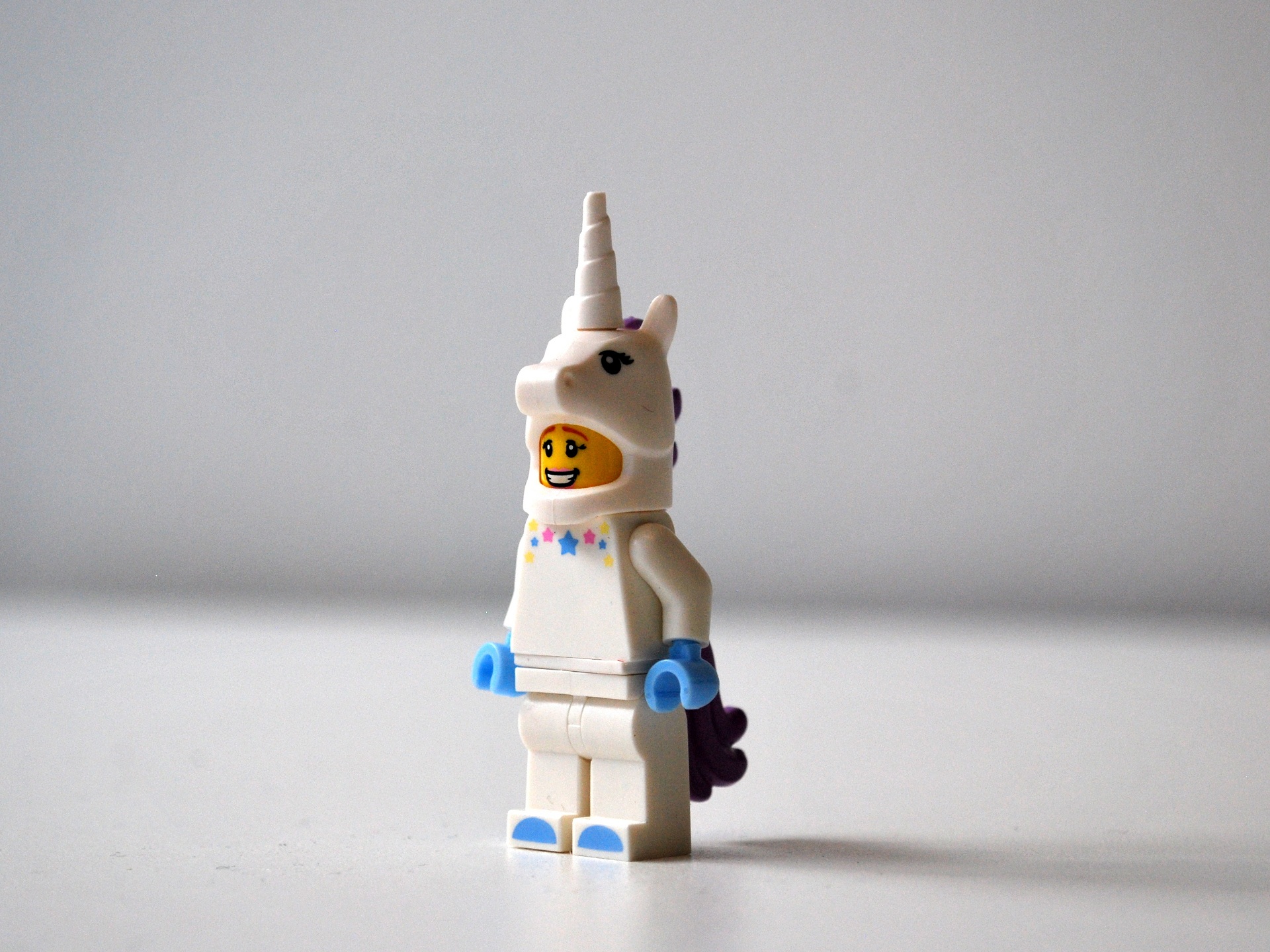 single object, creativity, figurine, no people, human representation, unicorn, small, 1080P, plastic, white color, table, copy space, characters, studio shot, HD Wallpaper