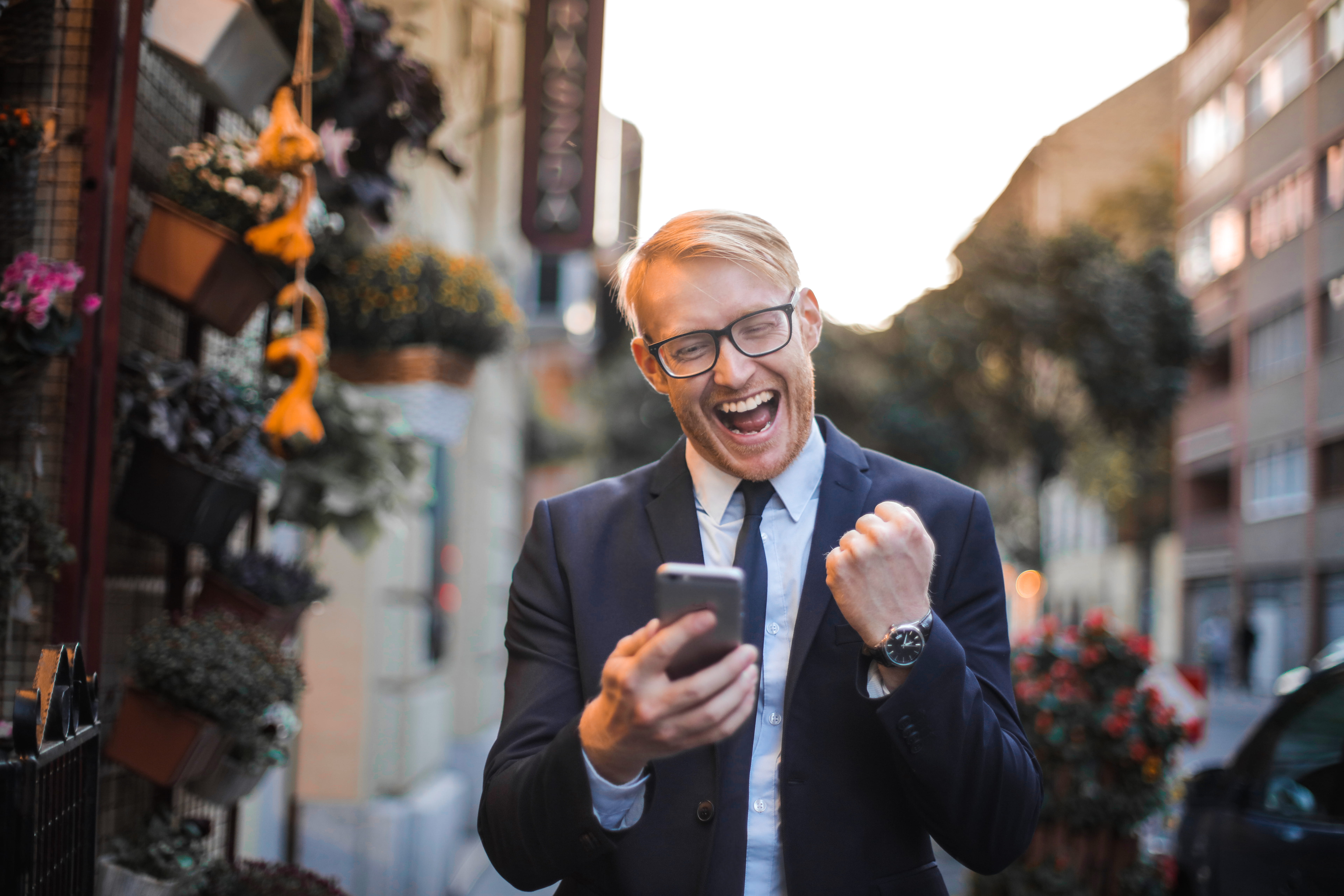 adult, wear, waist up, technology, mobile phone, joy, eyeglasses, facial expression, front view, emotion, men, communication, blur, architecture, focus, HD Wallpaper
