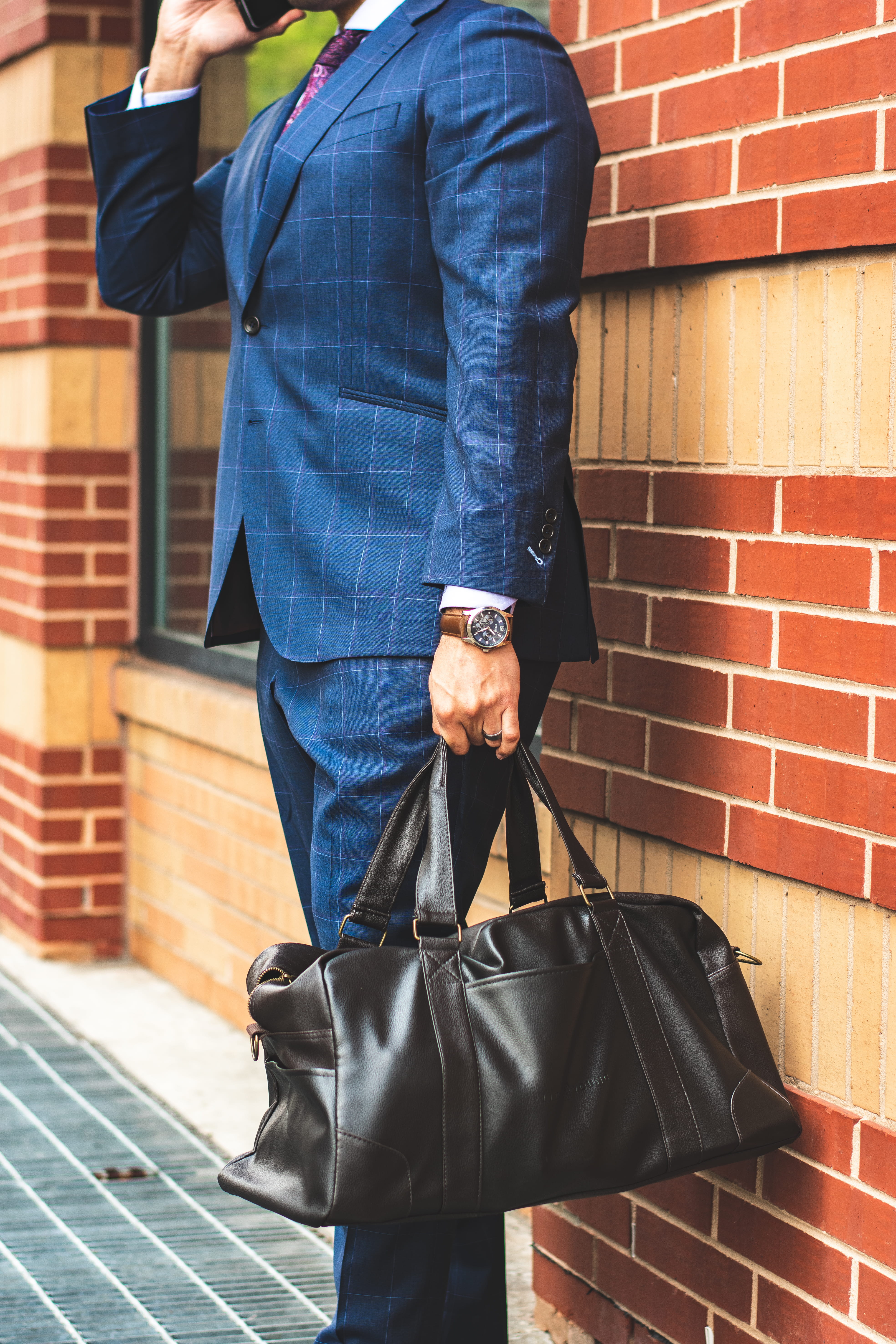 bag, fashion, daylight, holding, phone, corporate, wall, talking, one person, man, standing, suit, watch, street, near, men, lifestyles, concrete, businessman, Phone HD Wallpaper