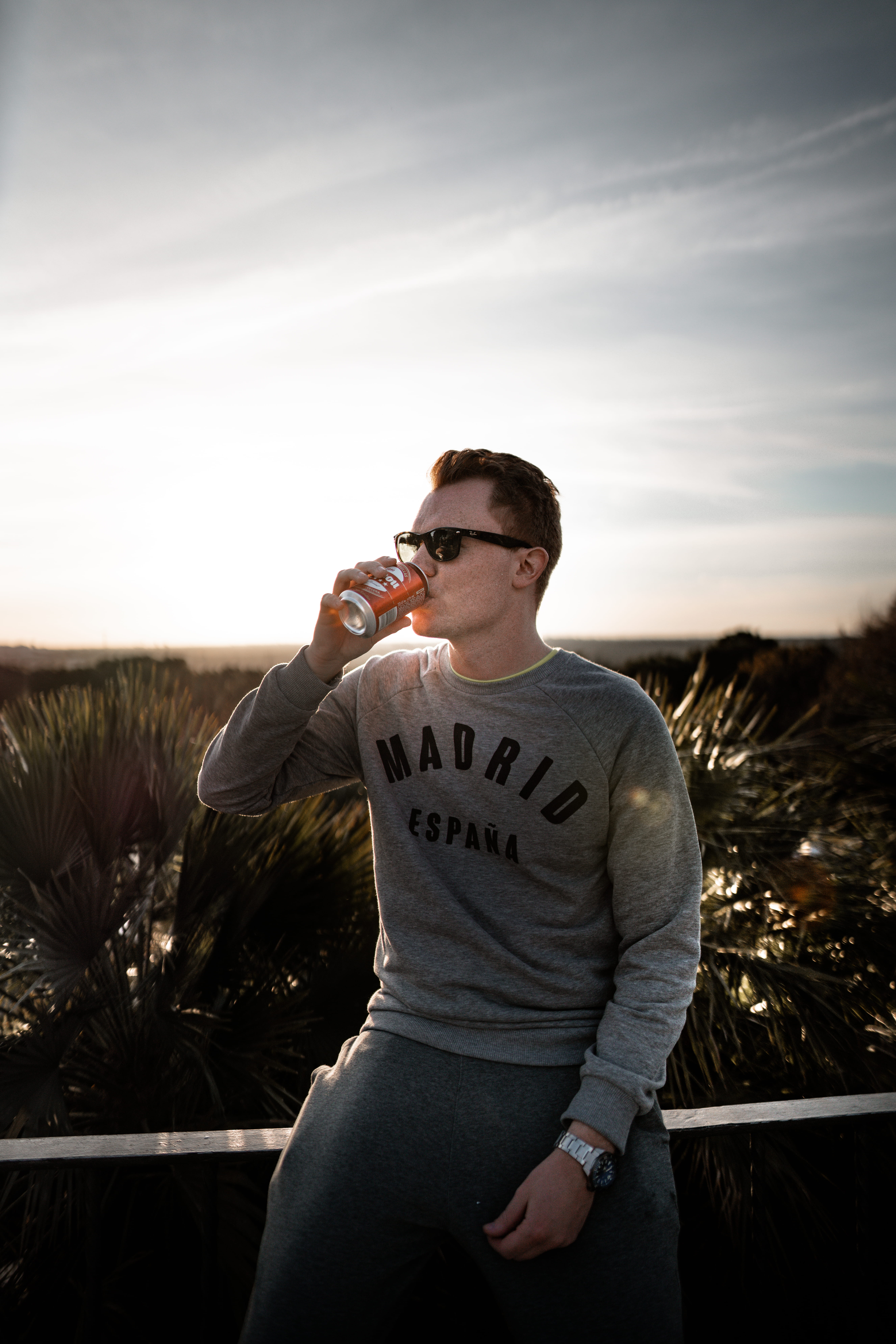 plant, young men, lifestyles, drinking, long sleeve, one person, apparel, tree, young adult, real people, human, sky, outdoors, light, accessory, three quarter length, Phone HD Wallpaper
