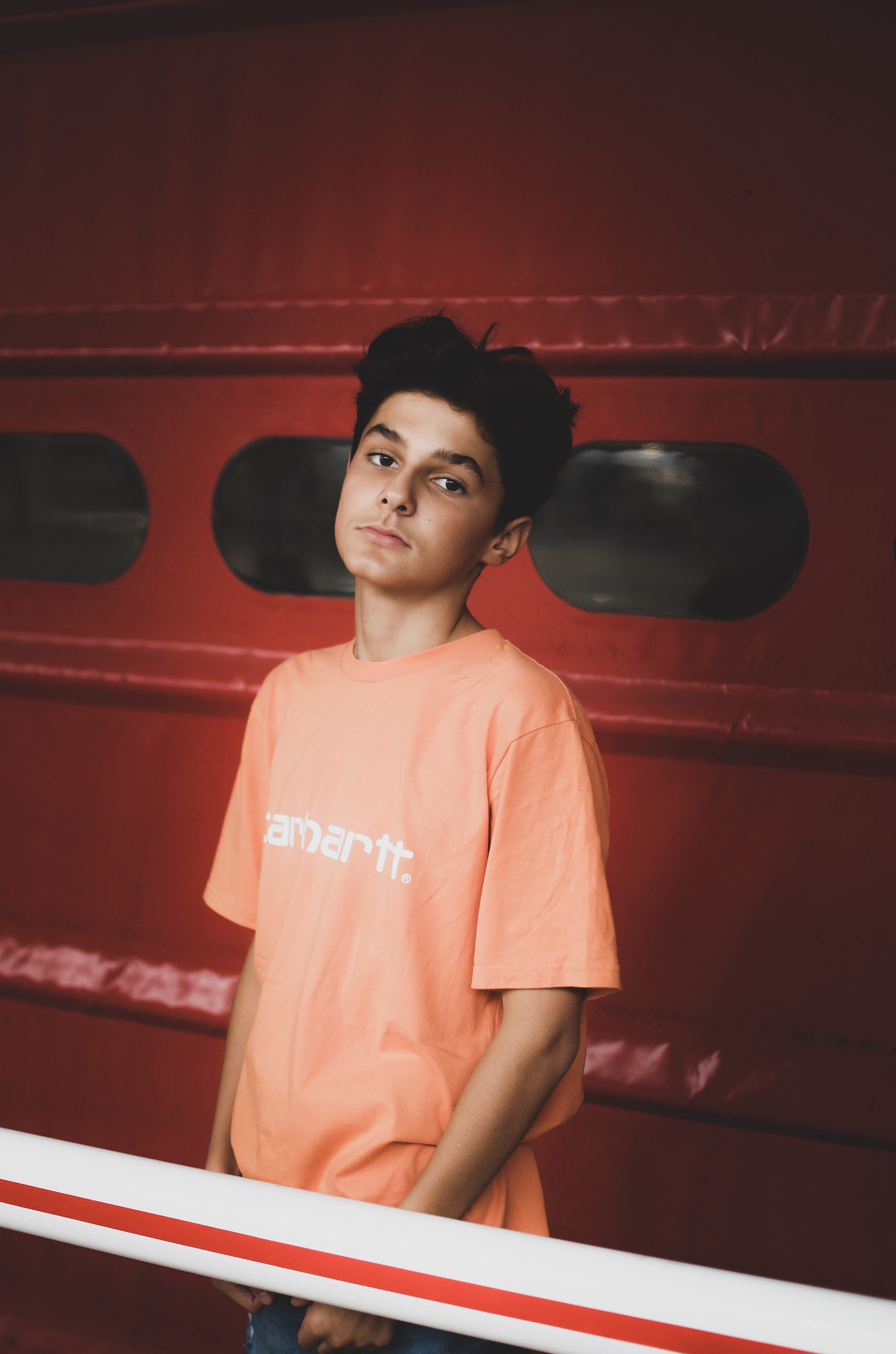 men, front view, handrail, 4K, red, long sleeve, door, female, wearing, portrait, banister, pre-adolescent child, lifestyles, apparel, clothing, orange, Phone HD Wallpaper