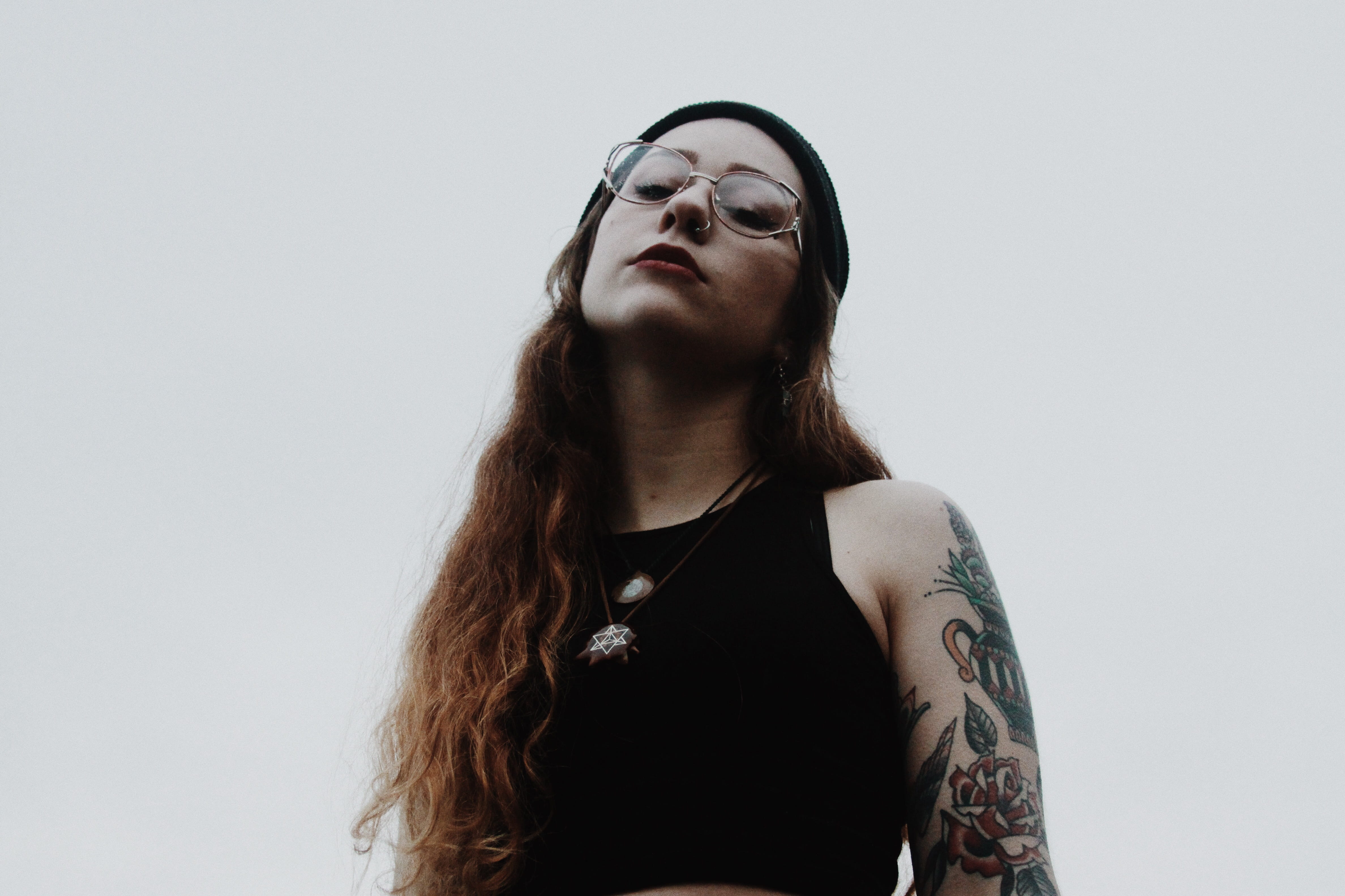 sleeveless, woman, long hair, looking up, framed, fashion, lady, one young woman only, wearing, outdoors, black, eyeglasses, headshot, one woman only, crop top, HD Wallpaper