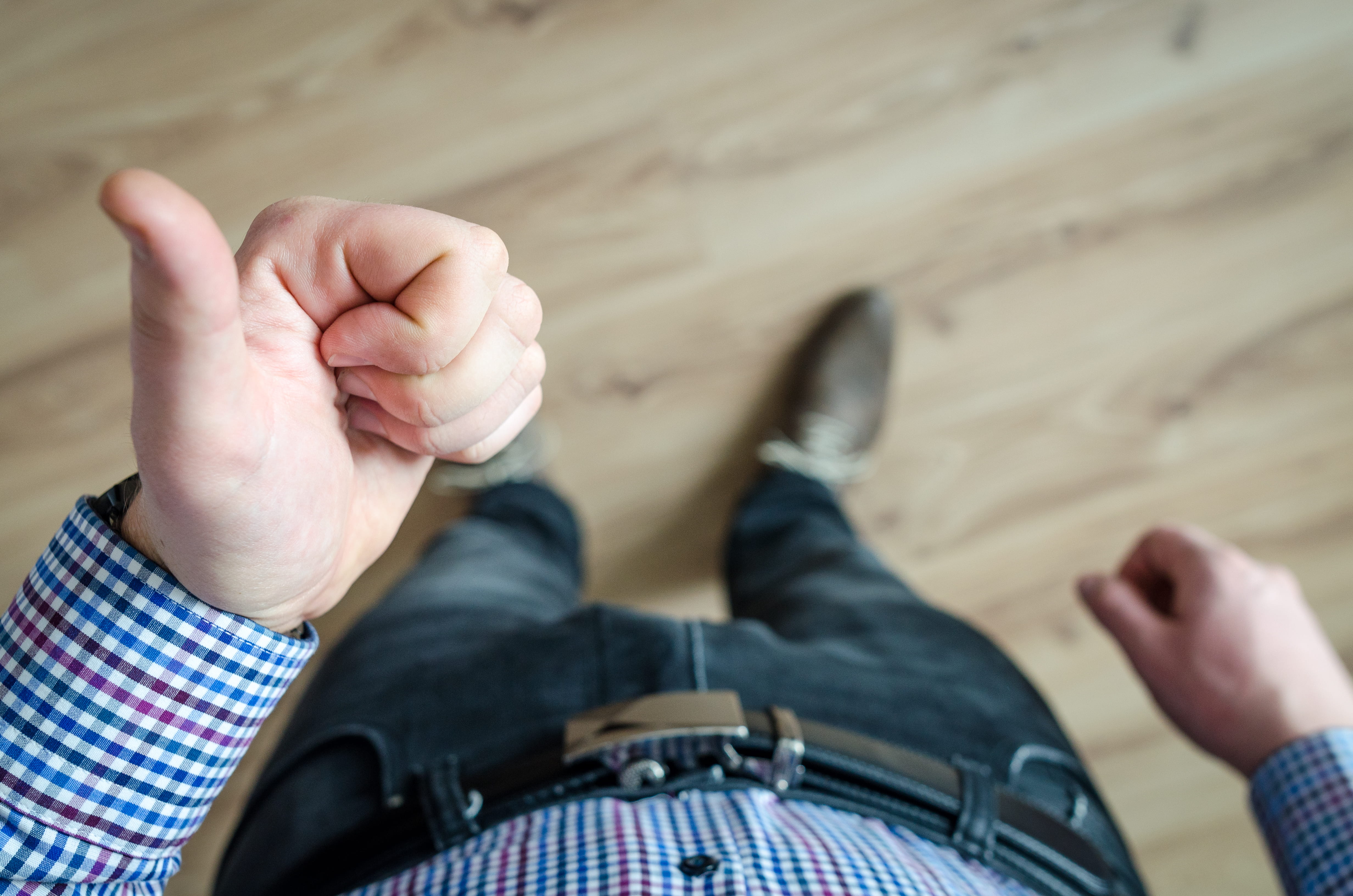 indoors, day, adult, human foot, young adult, hand, person, human limb, shirt, thumb, front view, selective focus, belt, one person, floor, negative emotion, HD Wallpaper