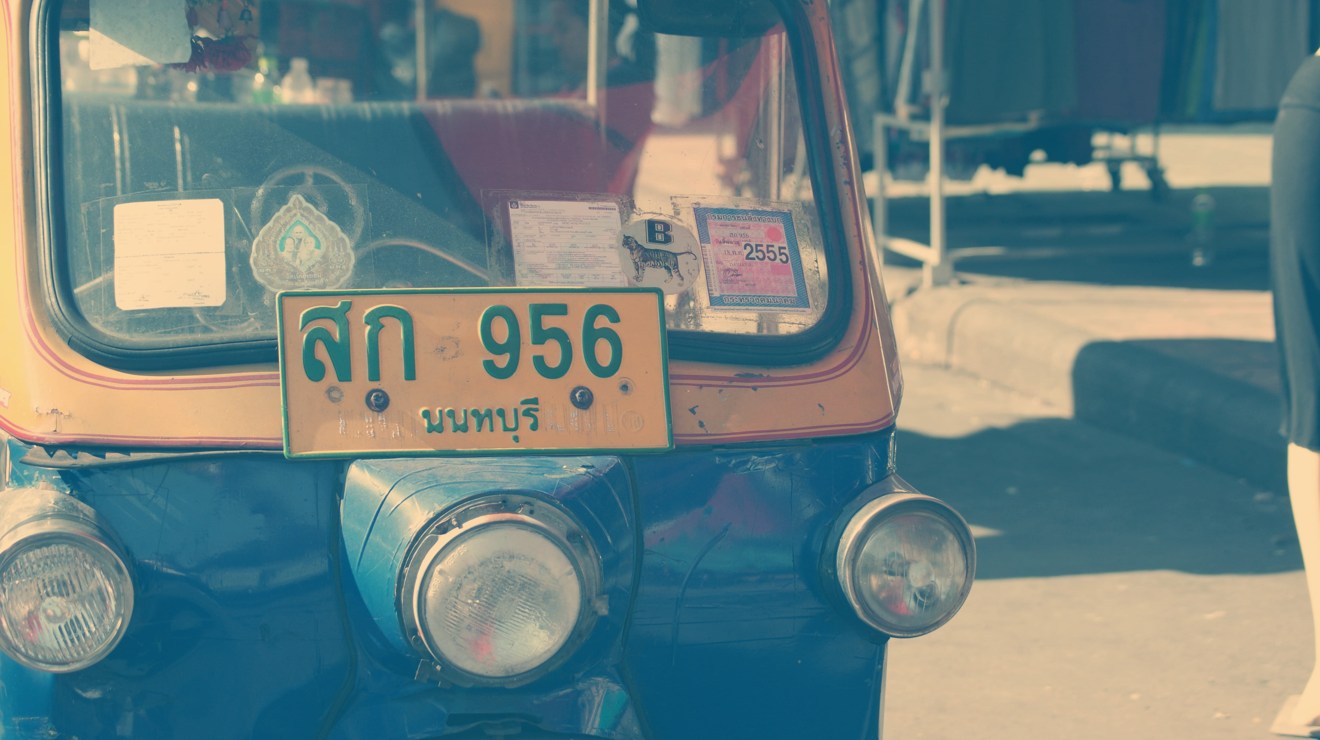 vehicle, sunlight, asian, tuk tuk, western script, outdoors, small, transportation, day, close-up, taxi, glass - material, sign, 4K, permit, city, headlights, HD Wallpaper
