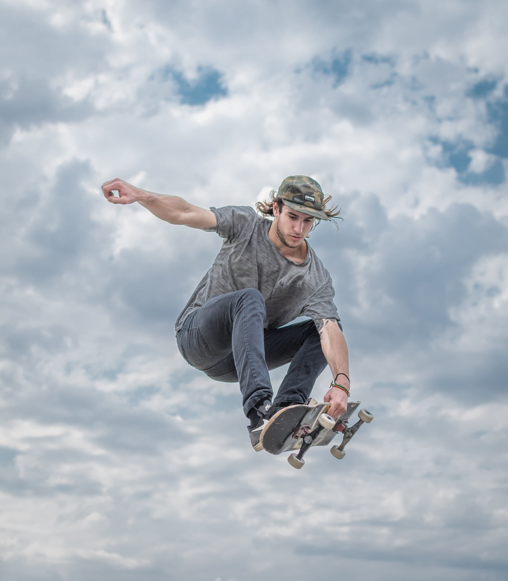 low angle view, nature, casual clothing, outdoors, real people, sport, limb, jeans, young adult, one person, cloud - sky, jumping, human arm, physical activity, Phone HD Wallpaper
