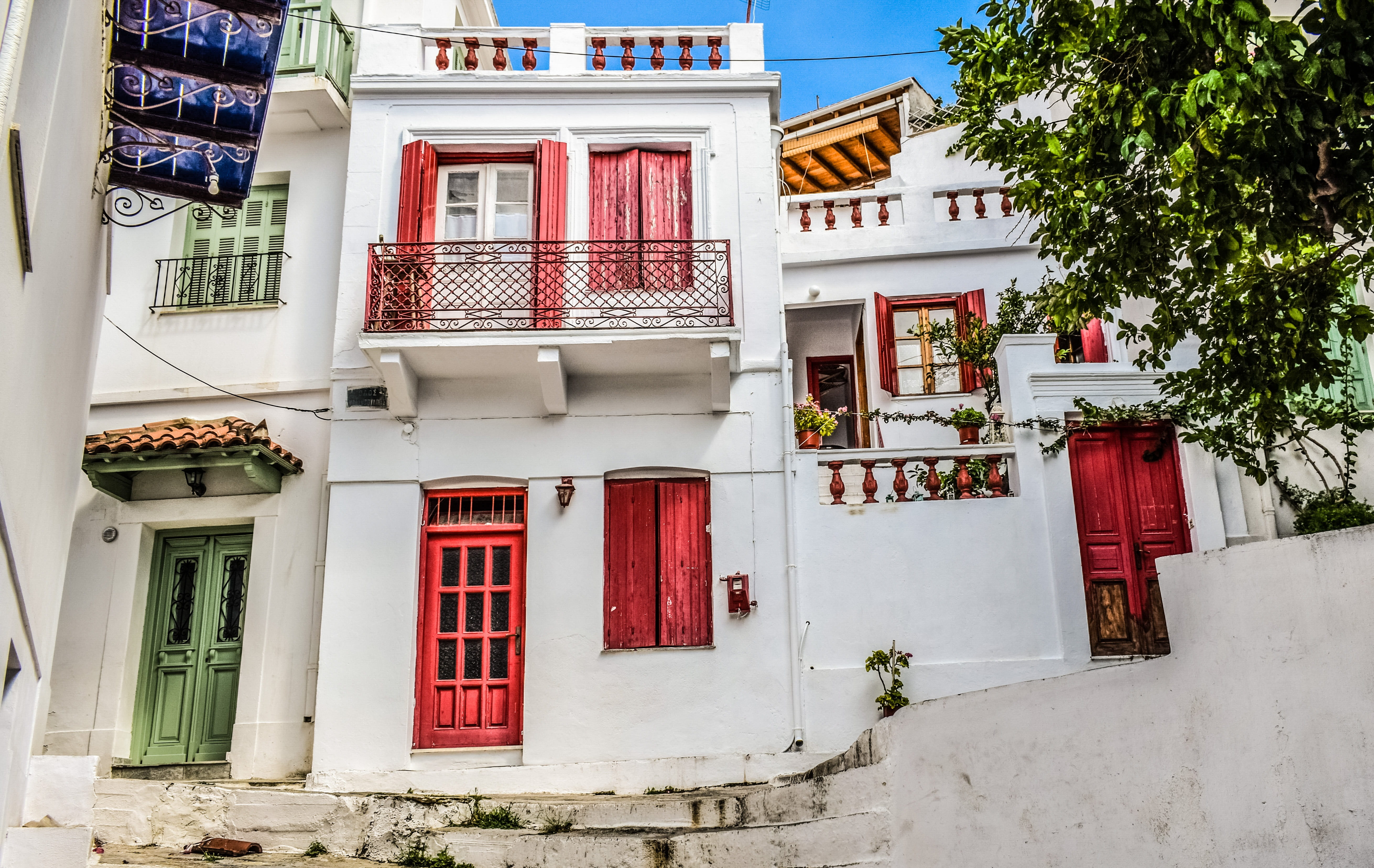 red, leaf, daytime, no people, story, tree, hanging, traditional, greece, white, day, chora, door, street, architecture, nature, building, concrete, built structure, HD Wallpaper