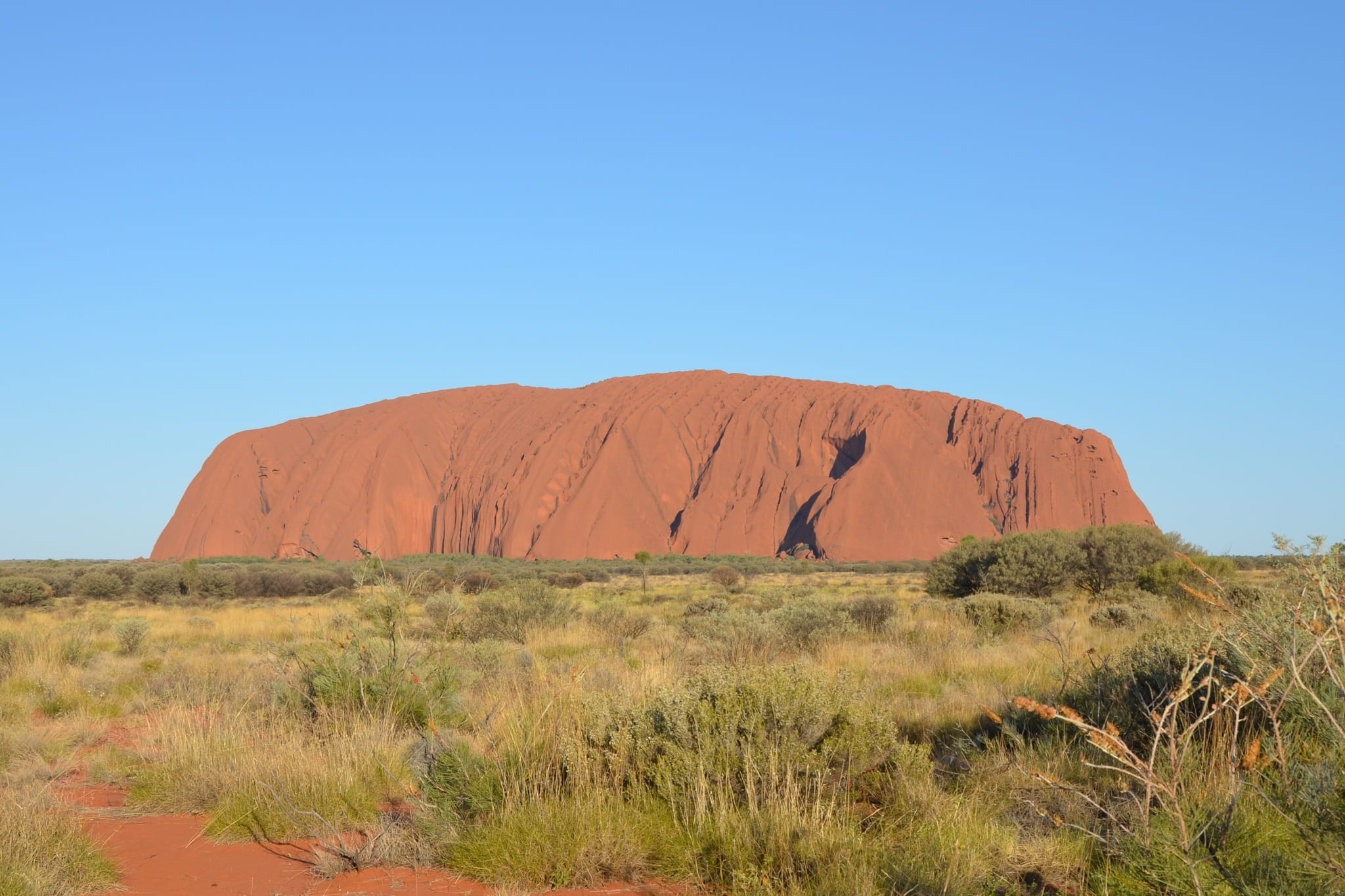 blue, grass, Landscape, environment, sunlight, arid climate, rock, 1080P, outdoors, desert, no people, Monolith, day, australia, plant, beauty in nature, HD Wallpaper