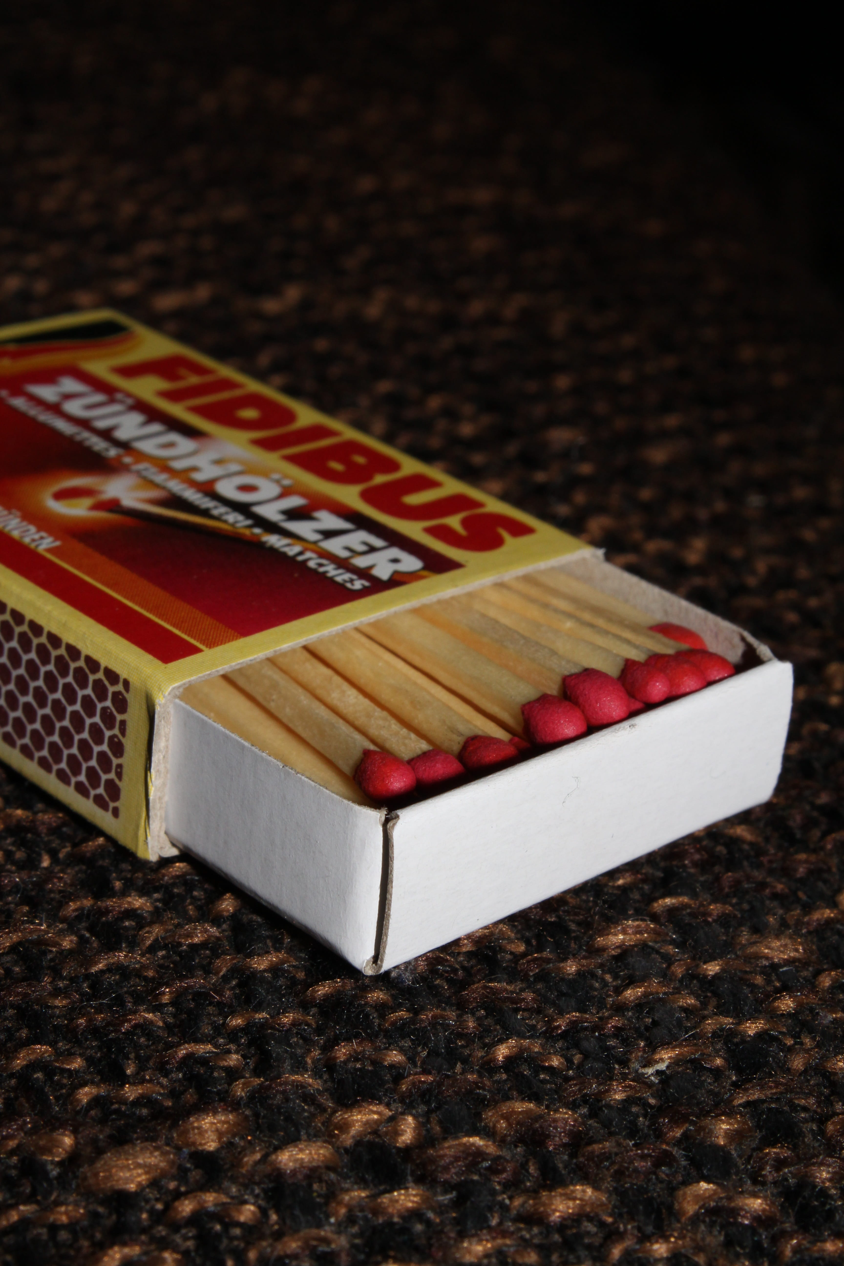 Match, relaxation, focus on foreground, Box, close-up, red, wood - material, table, still life, leisure games, Macro, no people, 5K, toy, black background, Phone HD Wallpaper