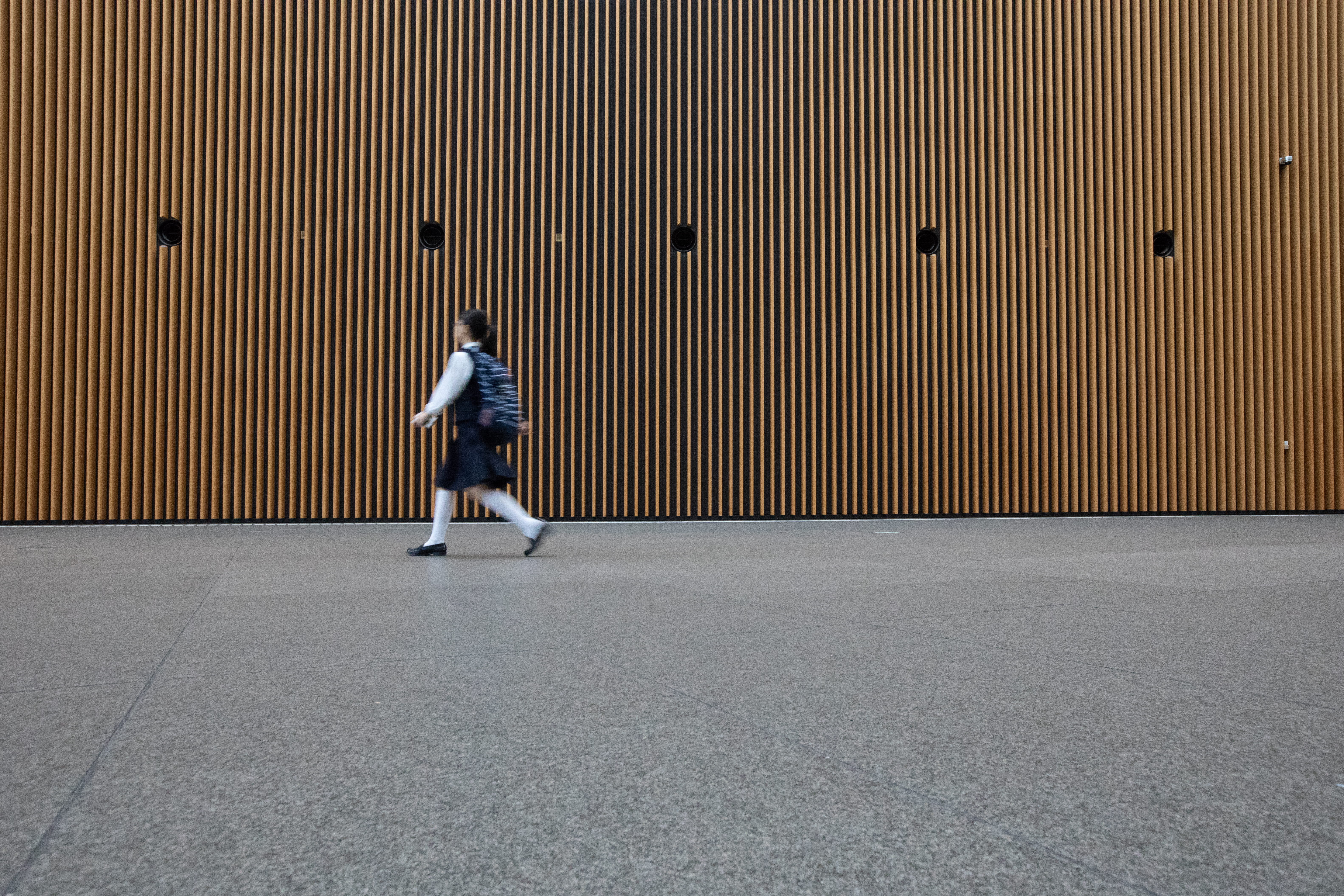 one person, chiyoda-ku, rear view, concrete, school, uniform, tokyo, pattern, men, gray, leisure activities, sunlight, motion, real people, motion blur, HD Wallpaper