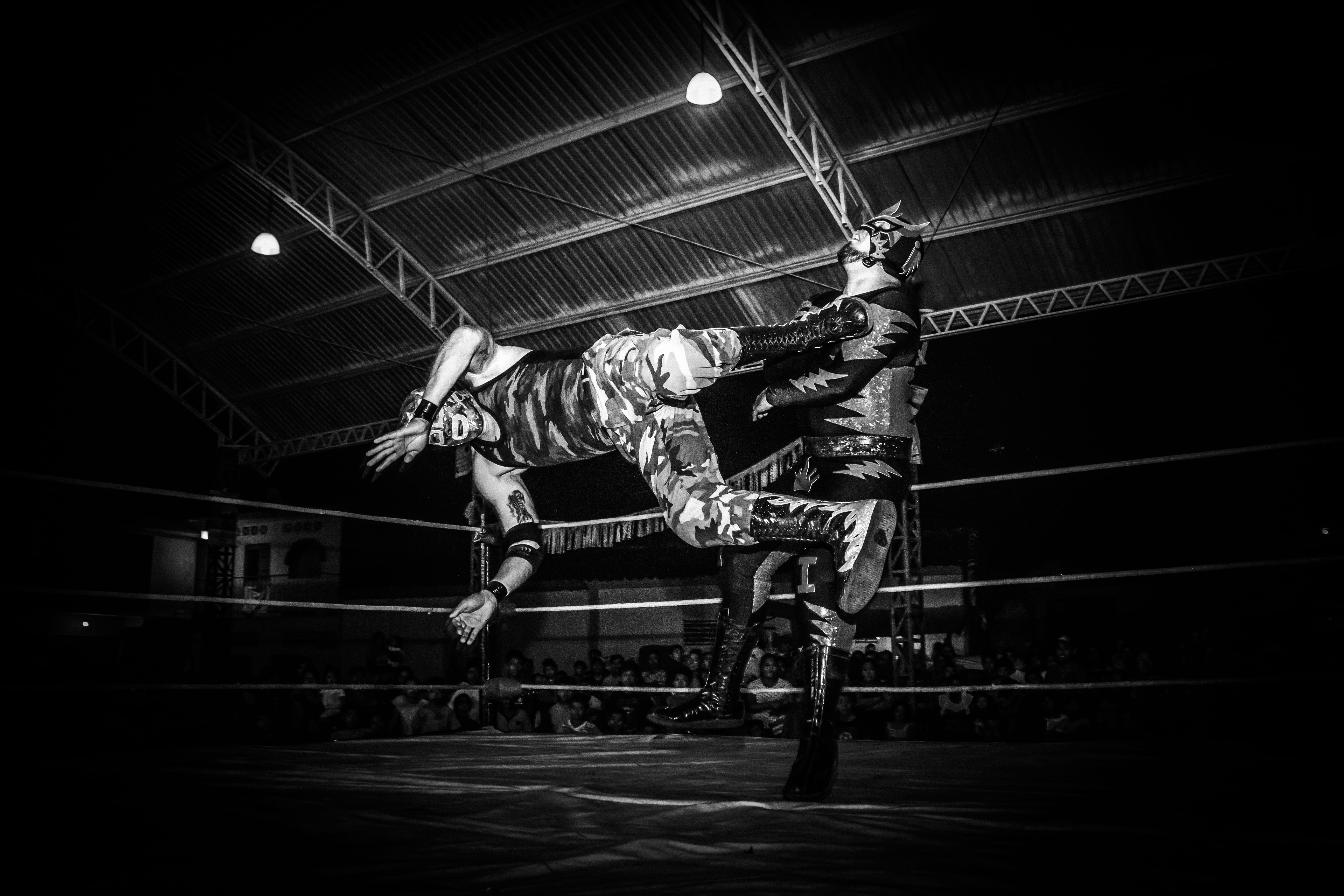 field, men, motion, dark, black and white, masks, real people, skill, full length, low angle view, sport, jumping, wrestling, people, entertainment, casual clothing, HD Wallpaper