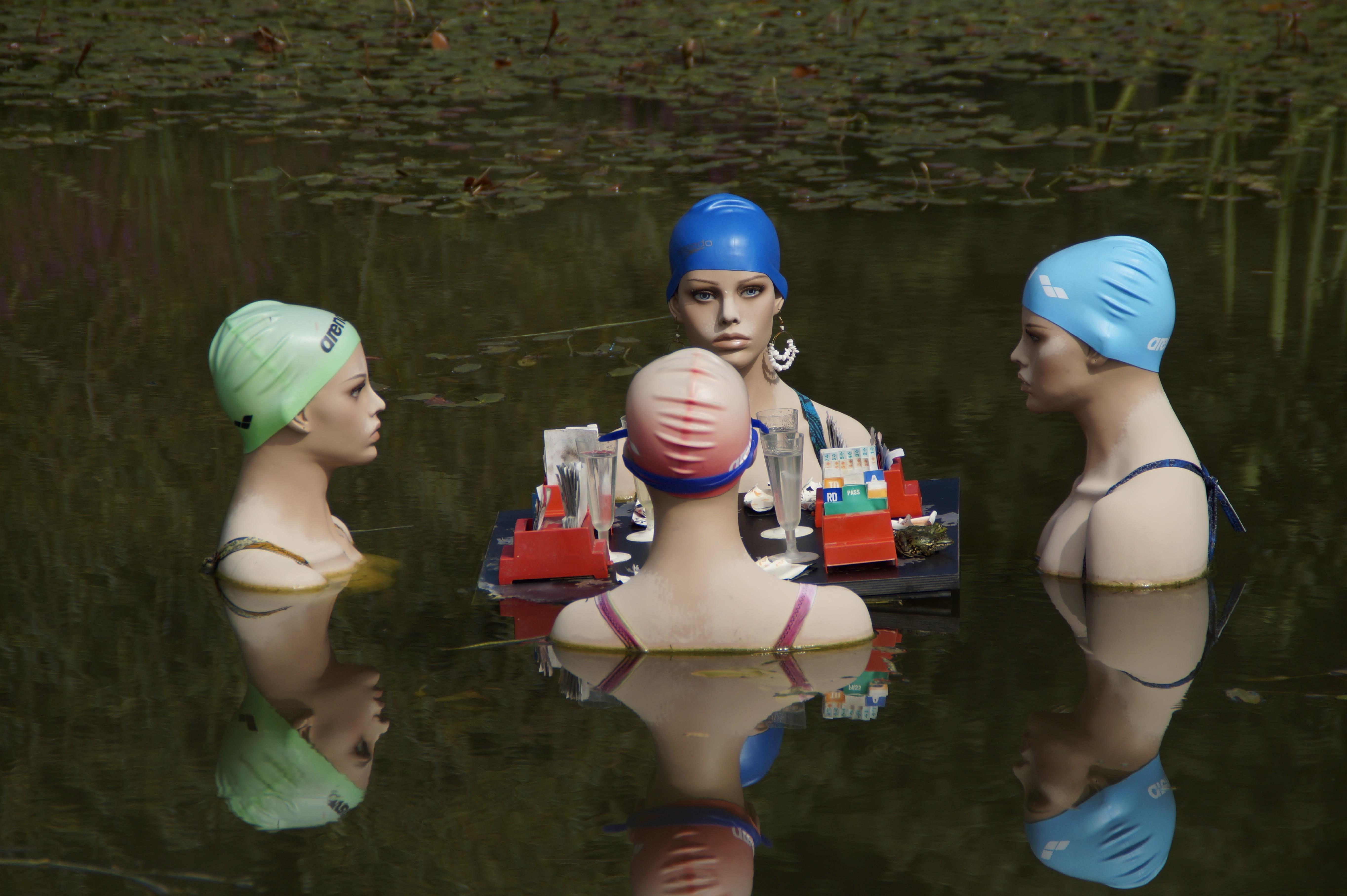 three quarter length, female, table, art, dolls, nature, 5K, leisure activity, chat, day, mannequins, swim cap, surrounding, water, mirroring, representation, HD Wallpaper