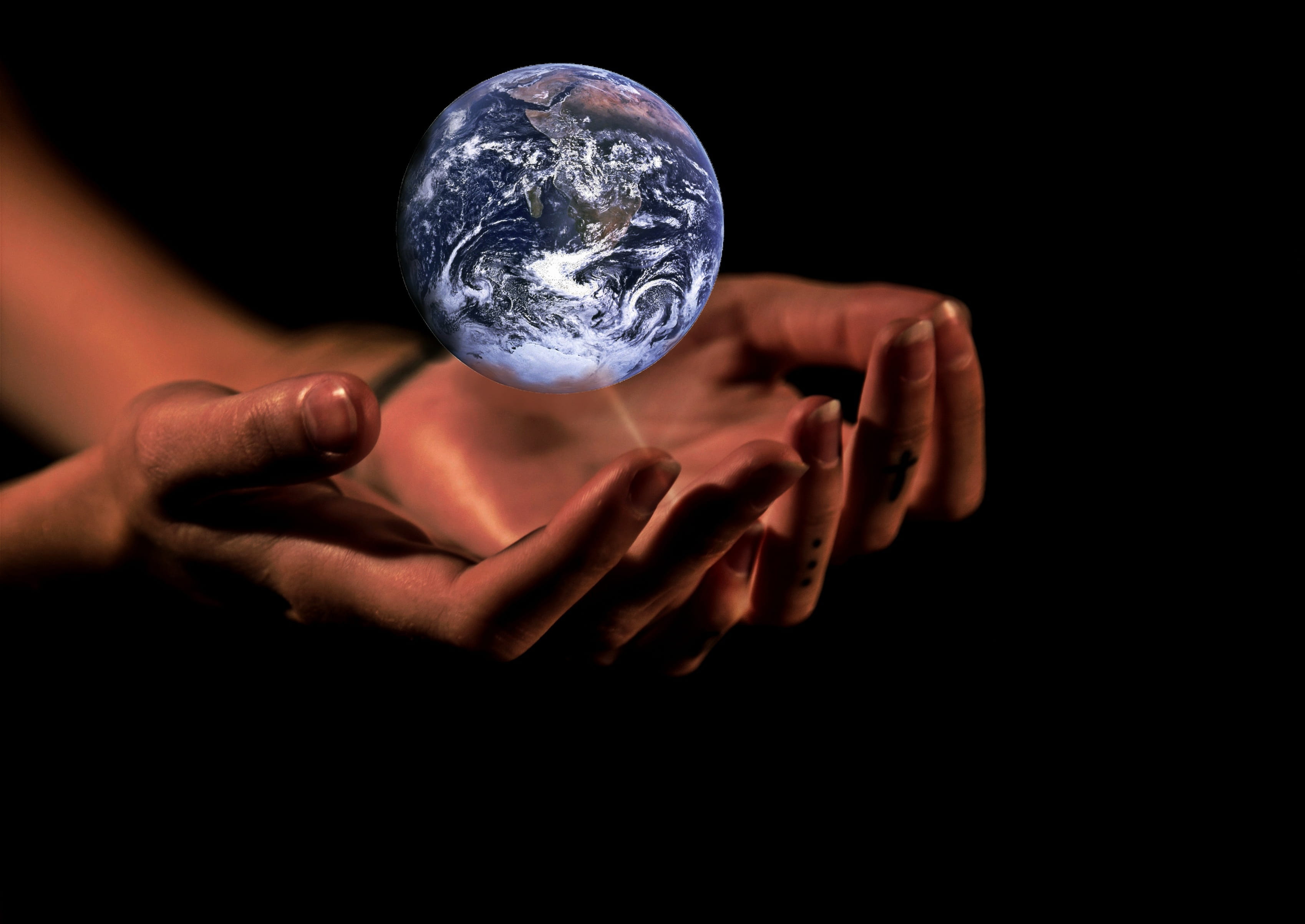 indoors, 2K, ball, planet earth, human body part, single object, close-up, dark, glass - material, human, shape, globe - man made object, holding, transparent, HD Wallpaper