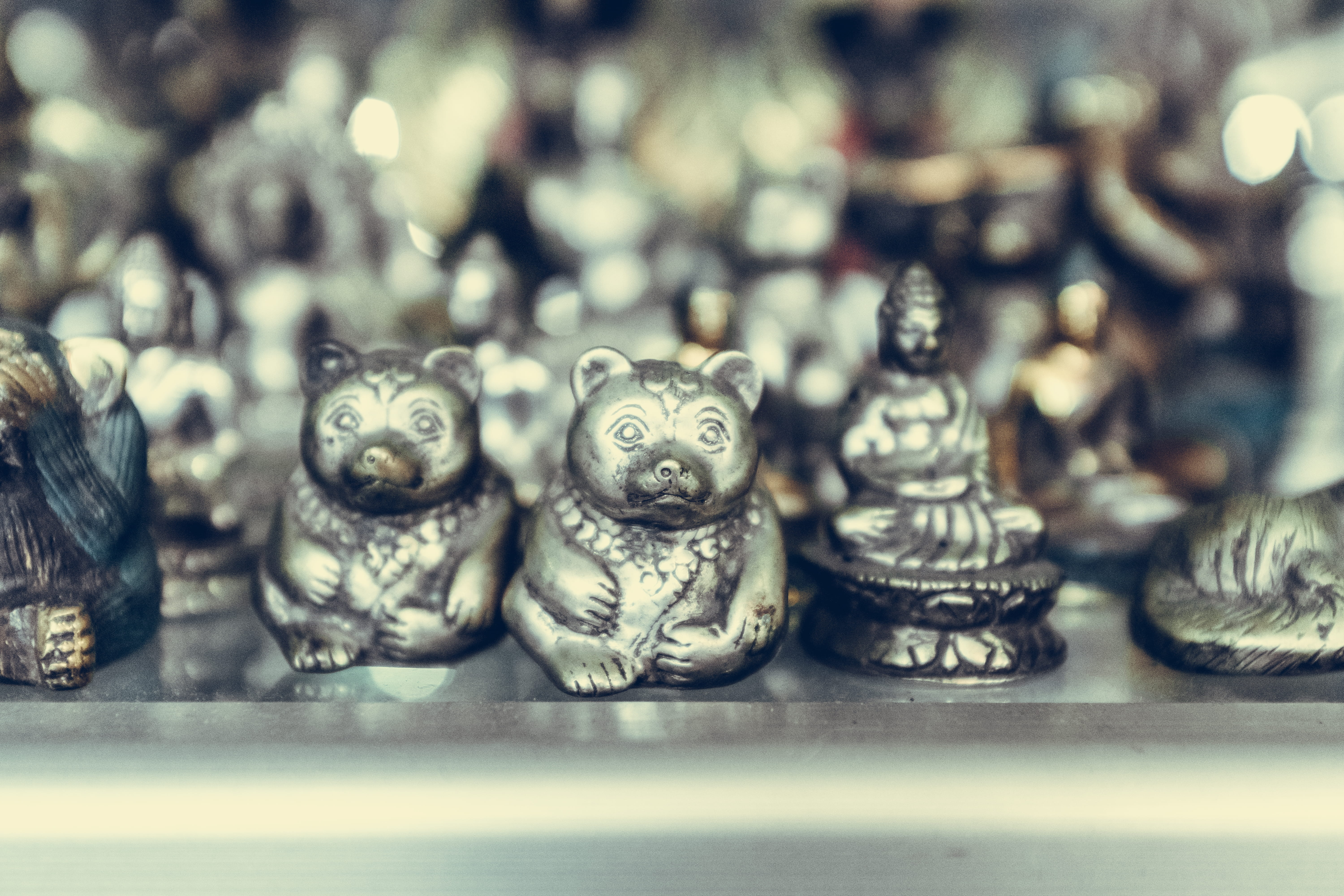 close, in a row, old, bear, buddha, worship, selective focus, representation, hindu, bronze, statue, side by side, close-up, still life, figurines, antique, HD Wallpaper