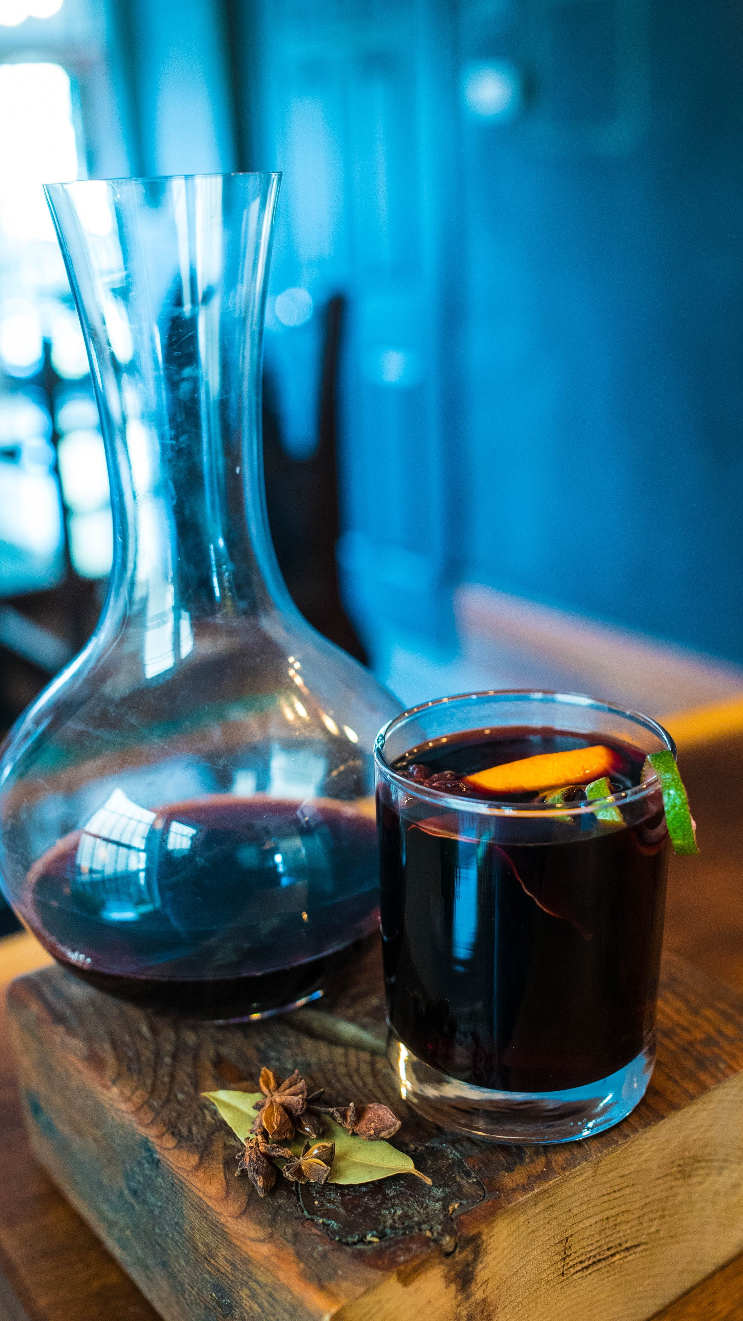 cinnamon, transparent, bottle, winter, focus on foreground, punch, blue, wood - material, wine, table, spice, food and drink, food, anise, mulled wine, Phone HD Wallpaper